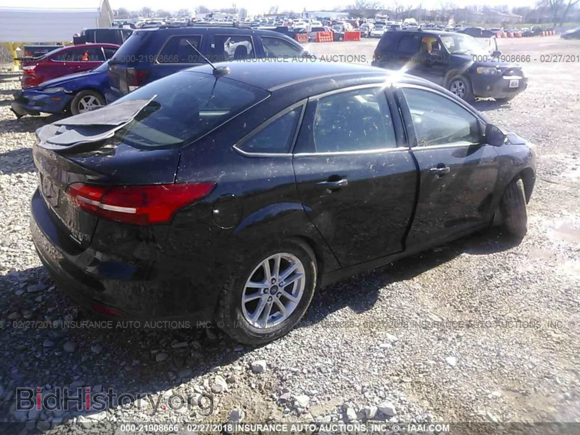 2015 Ford Focus - VIN: 1FADP3F23FL219412 - Photo 4