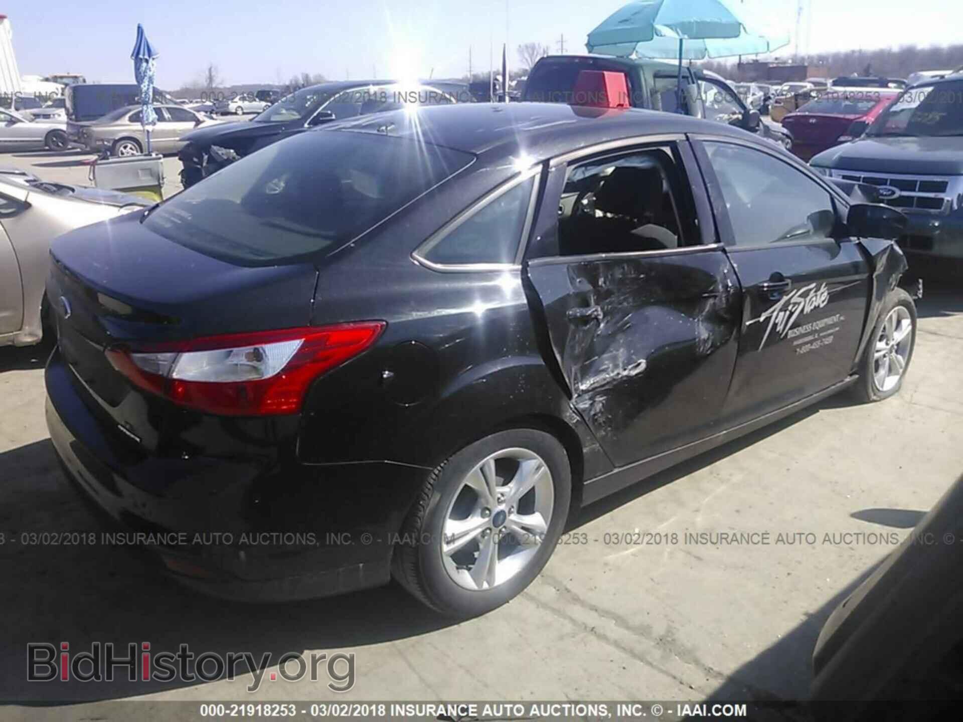 2014 Ford Focus - VIN: 1FADP3F2XEL396294 - Photo 4