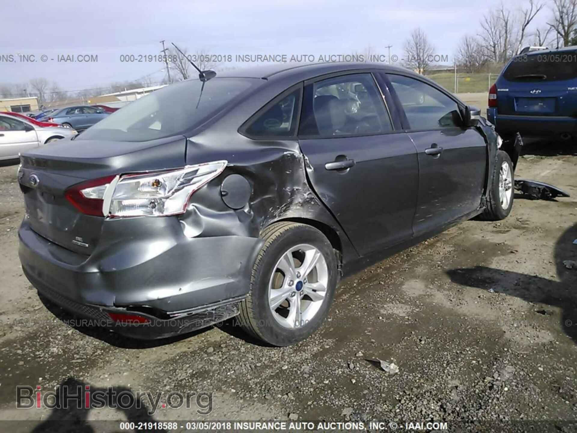 2014 Ford Focus - VIN: 1FADP3F29EL428572 - Photo 4