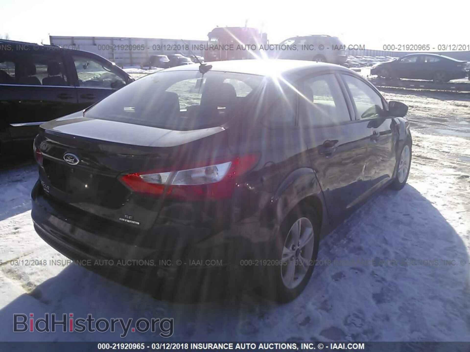2014 Ford Focus - VIN: 1FADP3F29EL431715 - Photo 4