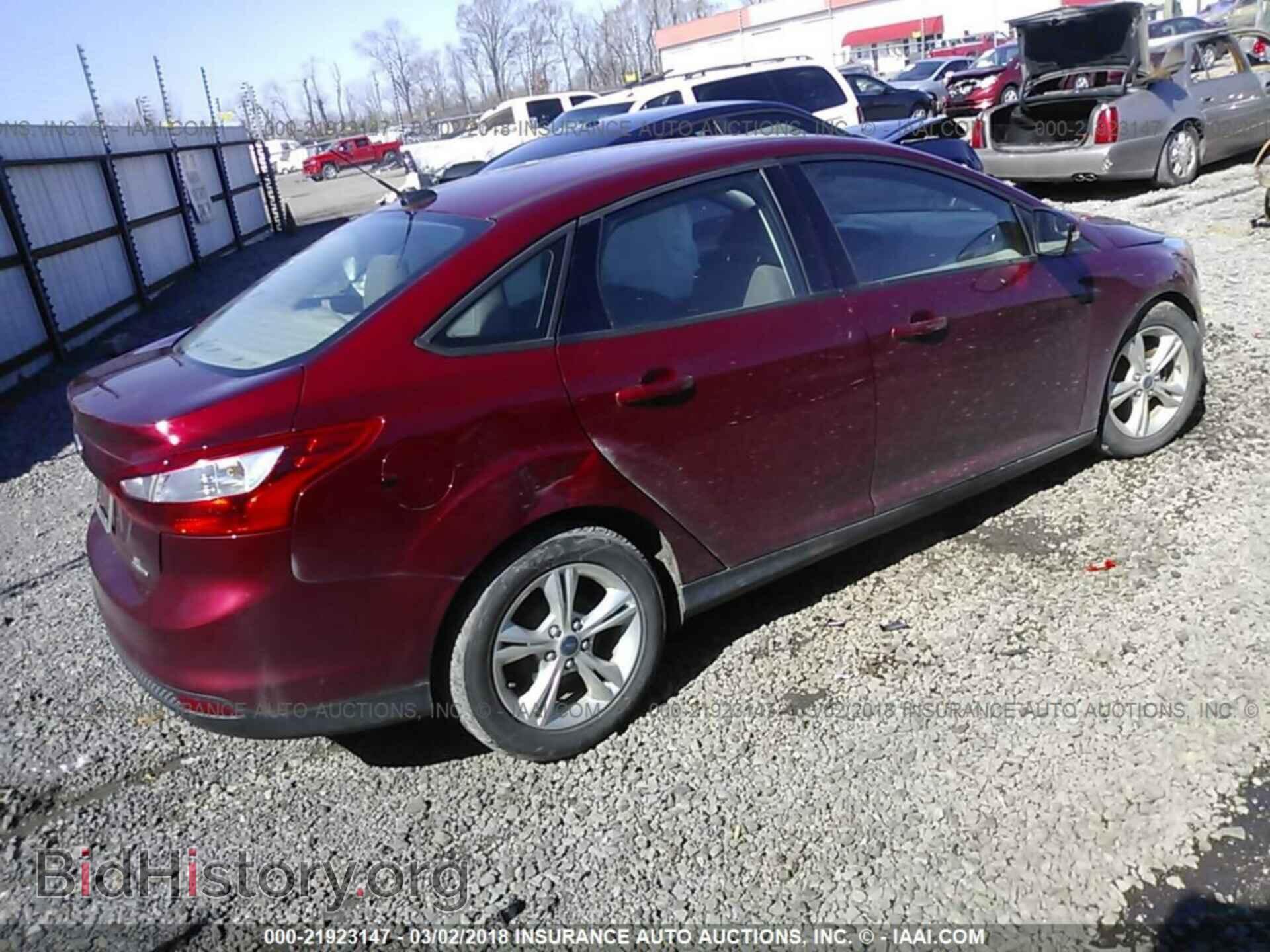 2014 Ford Focus - VIN: 1FADP3F21EL231394 - Фото 4