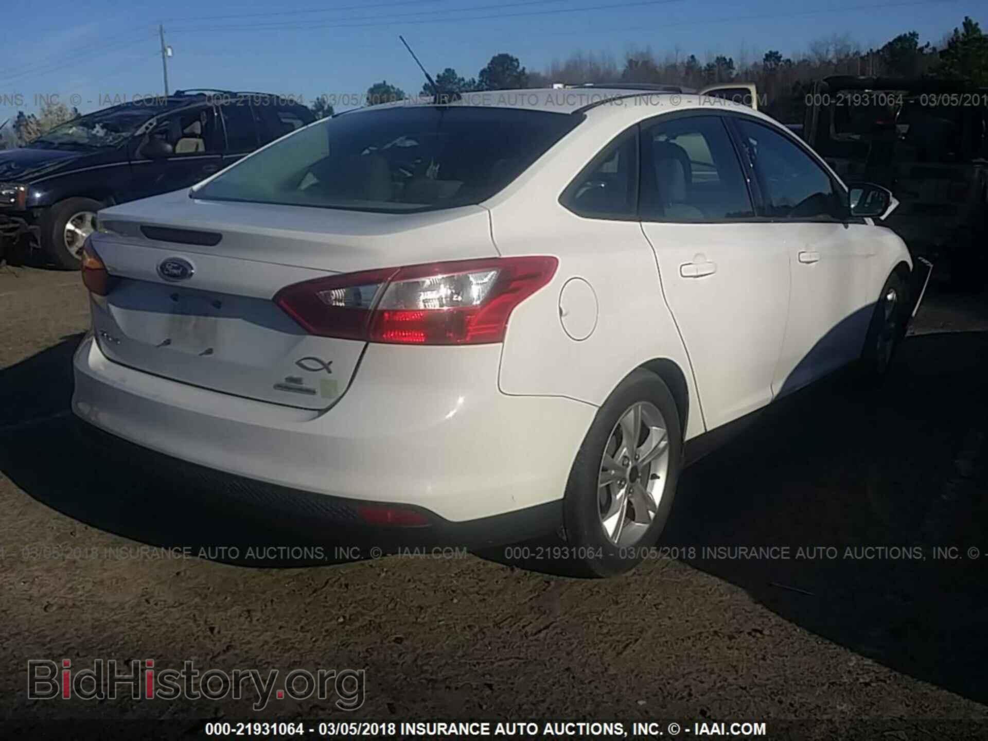 2014 Ford Focus - VIN: 1FADP3F2XEL387157 - Photo 4