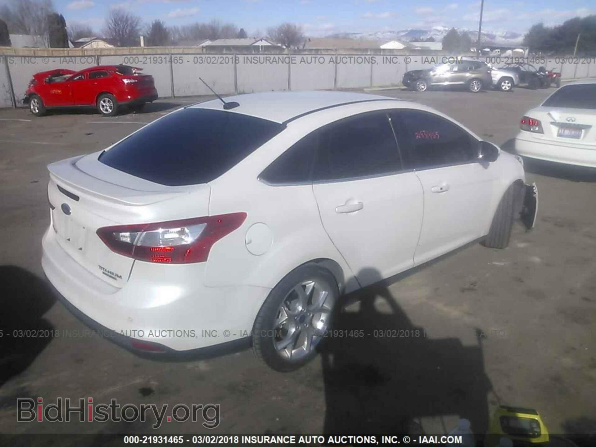 2014 Ford Focus - VIN: 1FADP3J25EL321252 - Фото 4