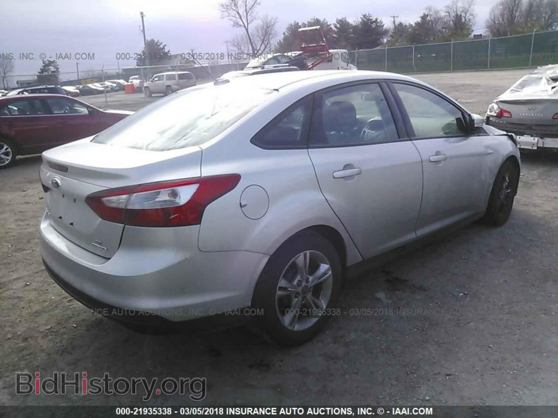 2014 Ford Focus - VIN: 1FADP3F2XEL145825 - Photo 4