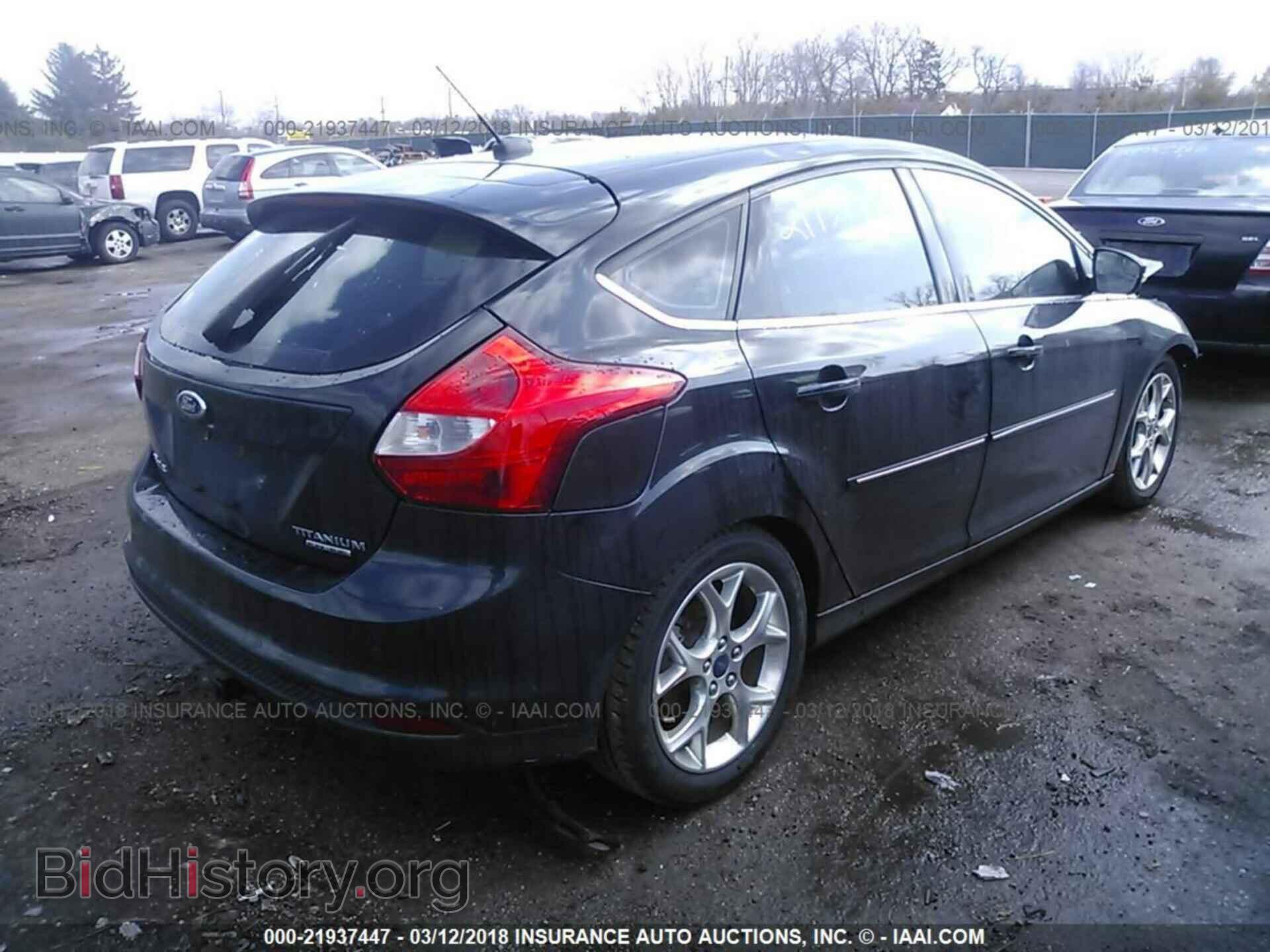 2014 Ford Focus - VIN: 1FADP3N21EL127828 - Photo 4