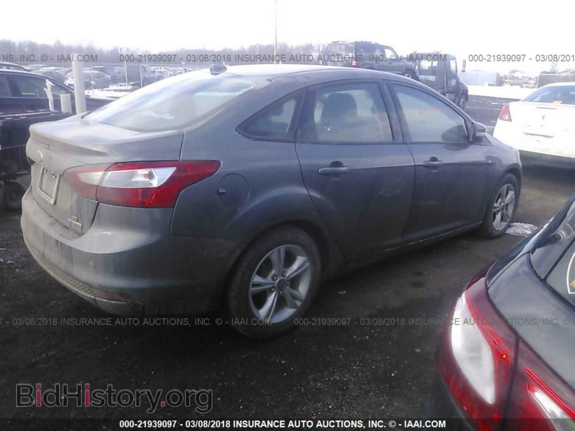 2014 Ford Focus - VIN: 1FADP3F2XEL423977 - Фото 4