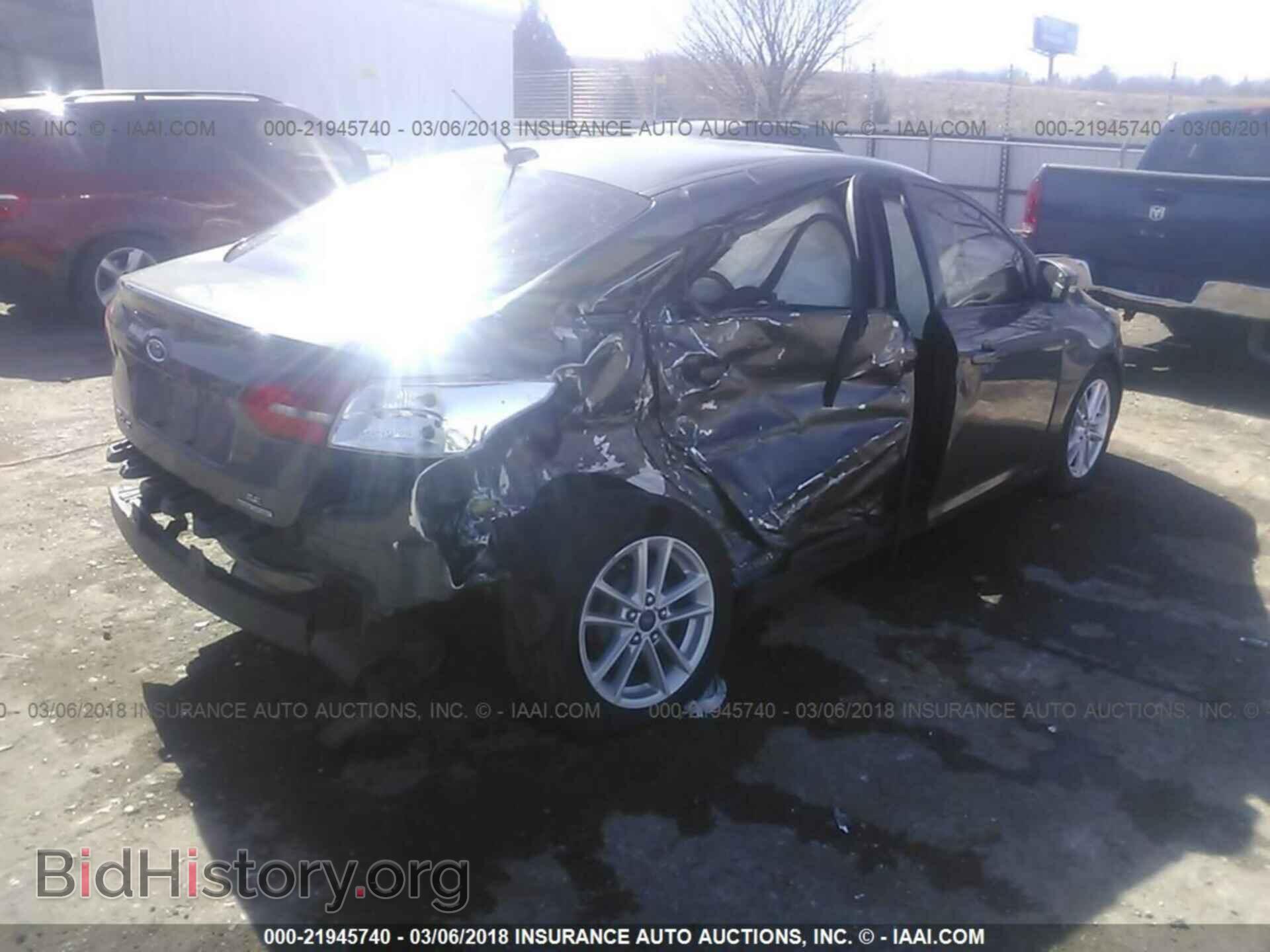 2015 Ford Focus - VIN: 1FADP3F27FL242563 - Photo 4