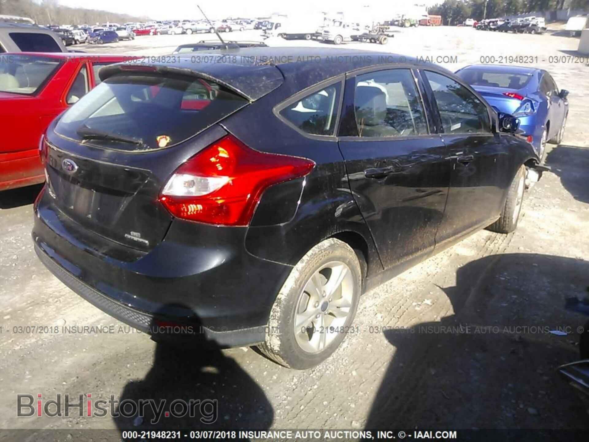 2013 Ford Focus - VIN: 1FADP3K28DL339659 - Photo 4