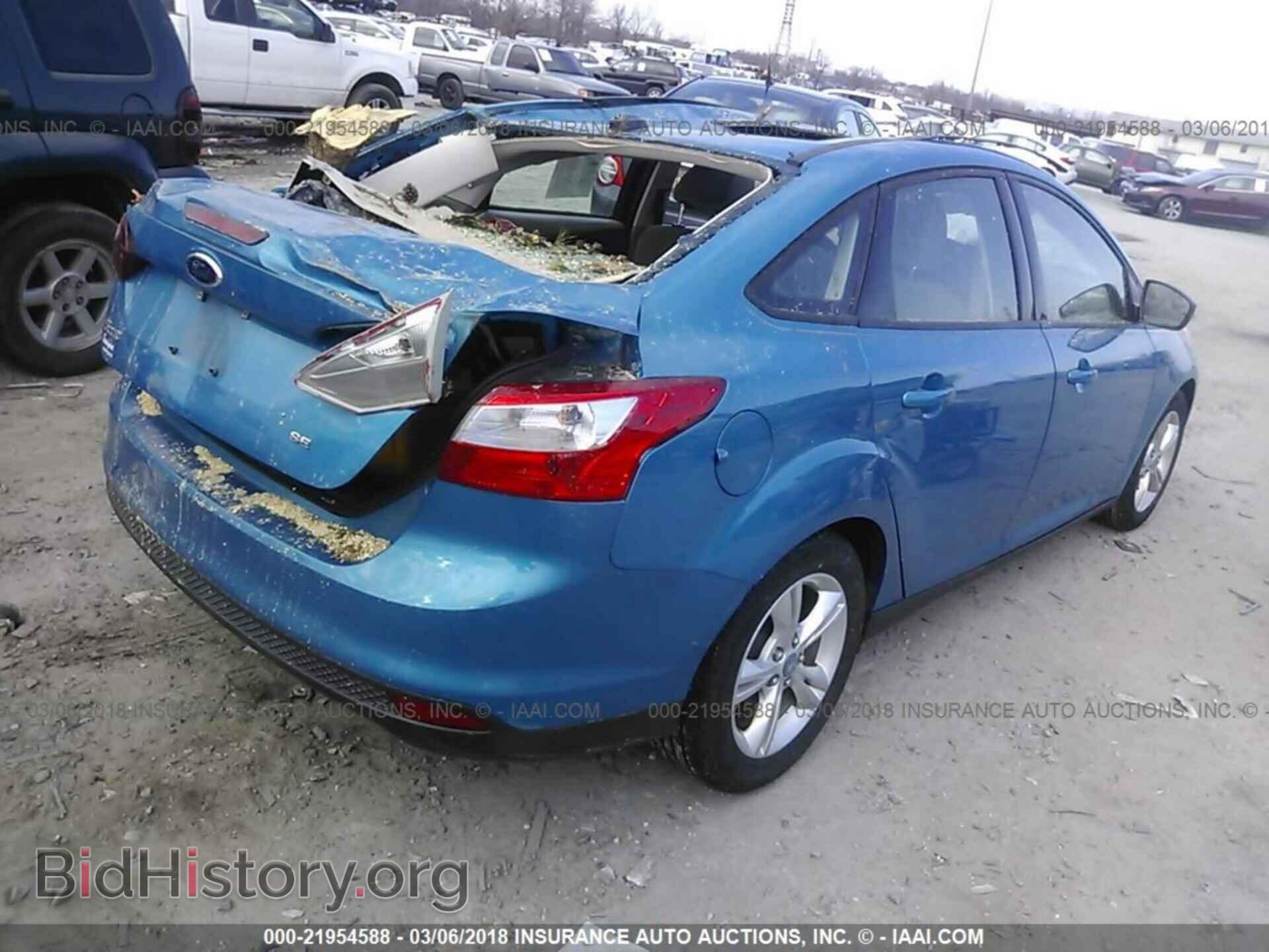 2013 Ford Focus - VIN: 1FADP3F28DL129072 - Фото 4