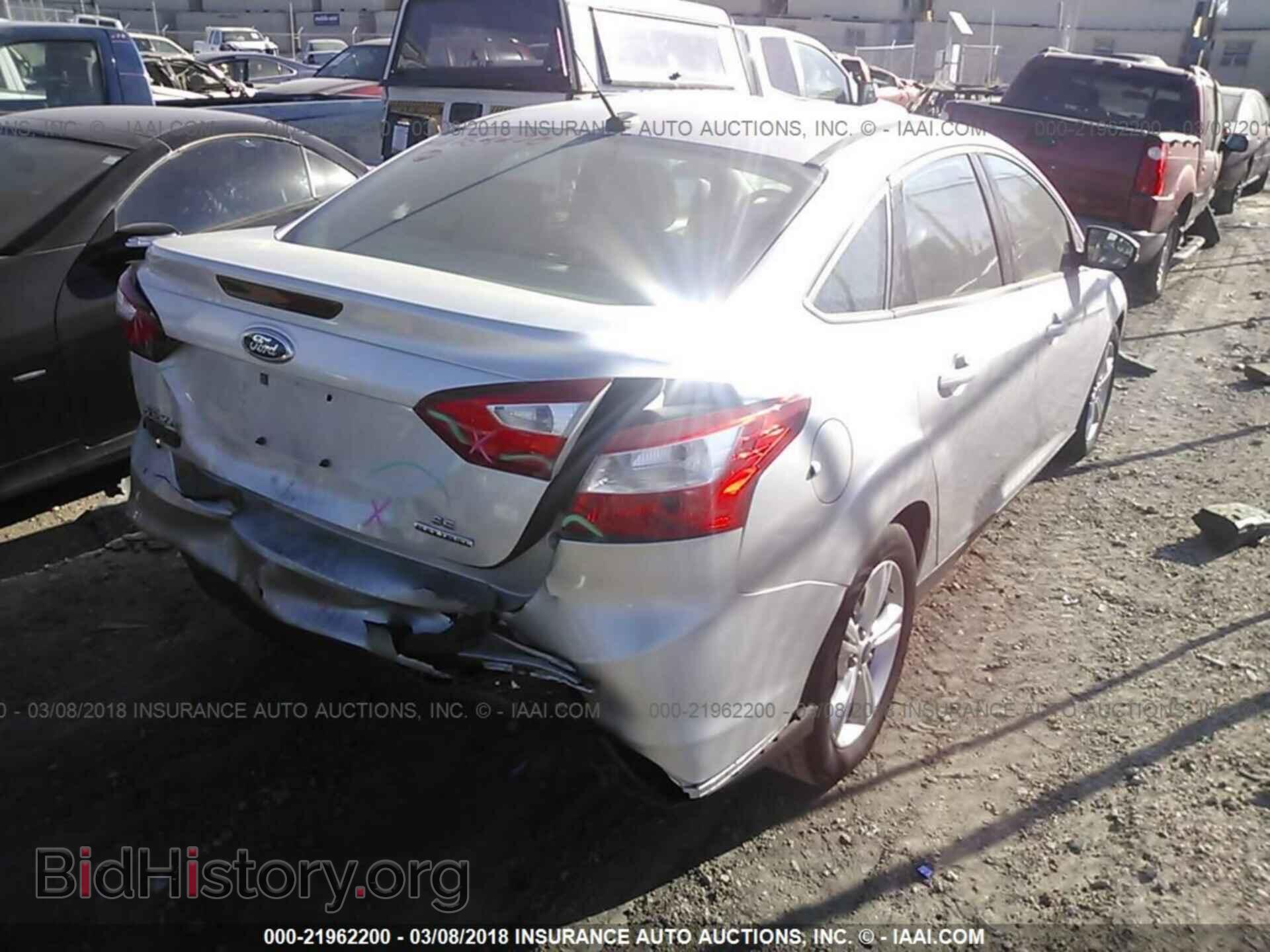 2014 Ford Focus - VIN: 1FADP3F24EL209017 - Photo 4