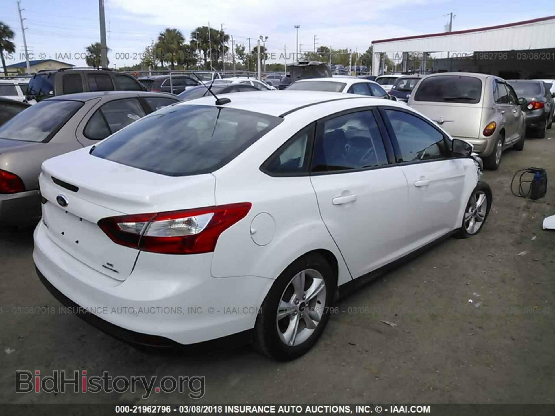 2014 Ford Focus - VIN: 1FADP3F21EL417193 - Photo 4