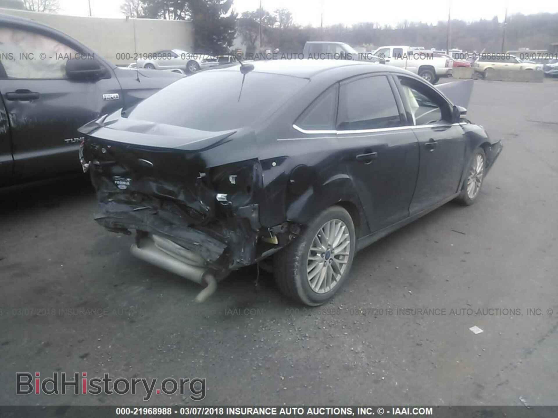 2014 Ford Focus - VIN: 1FADP3J21EL355592 - Photo 4