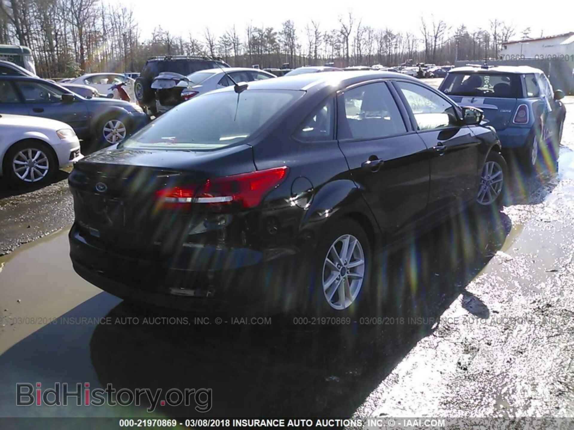 2016 Ford Focus - VIN: 1FADP3F21GL357385 - Photo 4