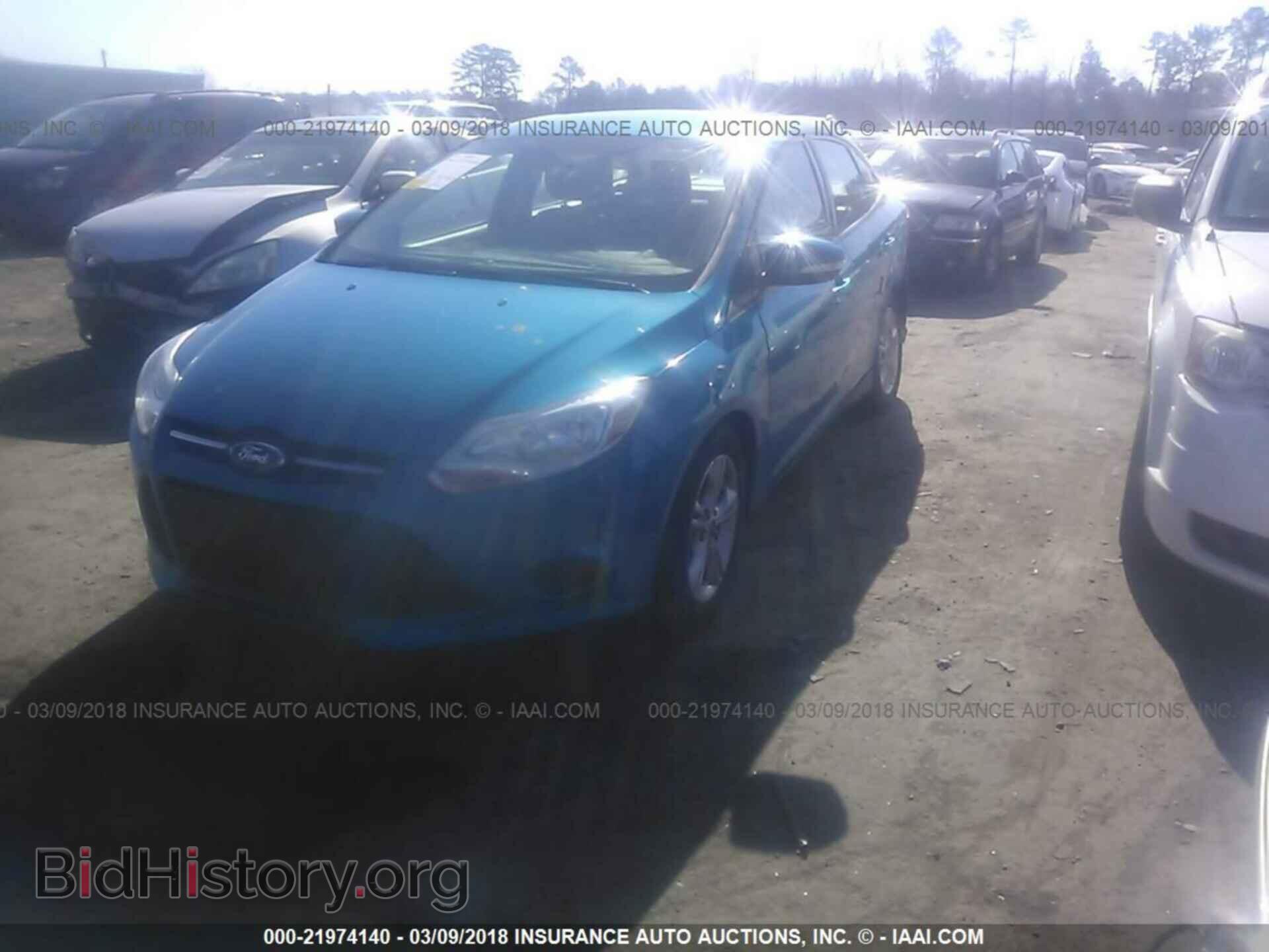 2014 Ford Focus - VIN: 1FADP3F20EL410736 - Фото 2