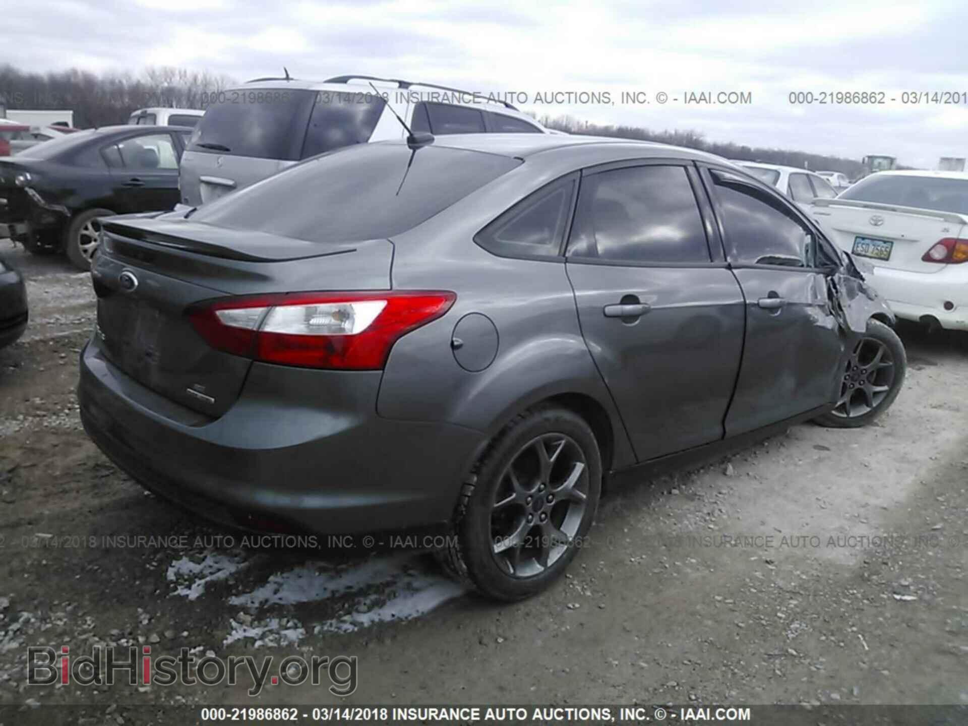 2014 Ford Focus - VIN: 1FADP3F25EL245556 - Фото 4
