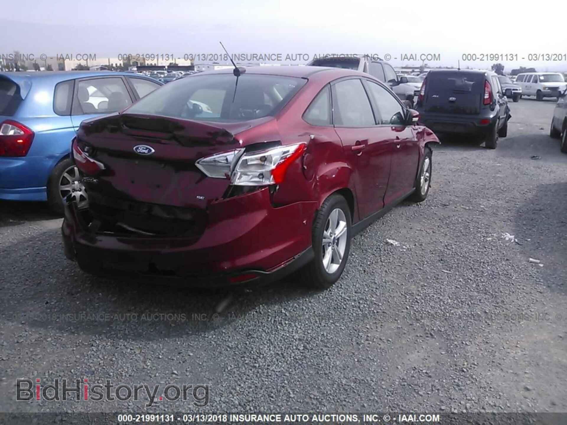 2013 Ford Focus - VIN: 1FADP3F24DL352967 - Photo 4