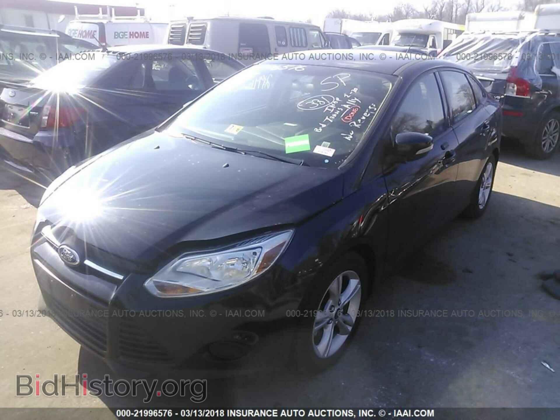 2014 Ford Focus - VIN: 1FADP3F22EL410575 - Фото 2