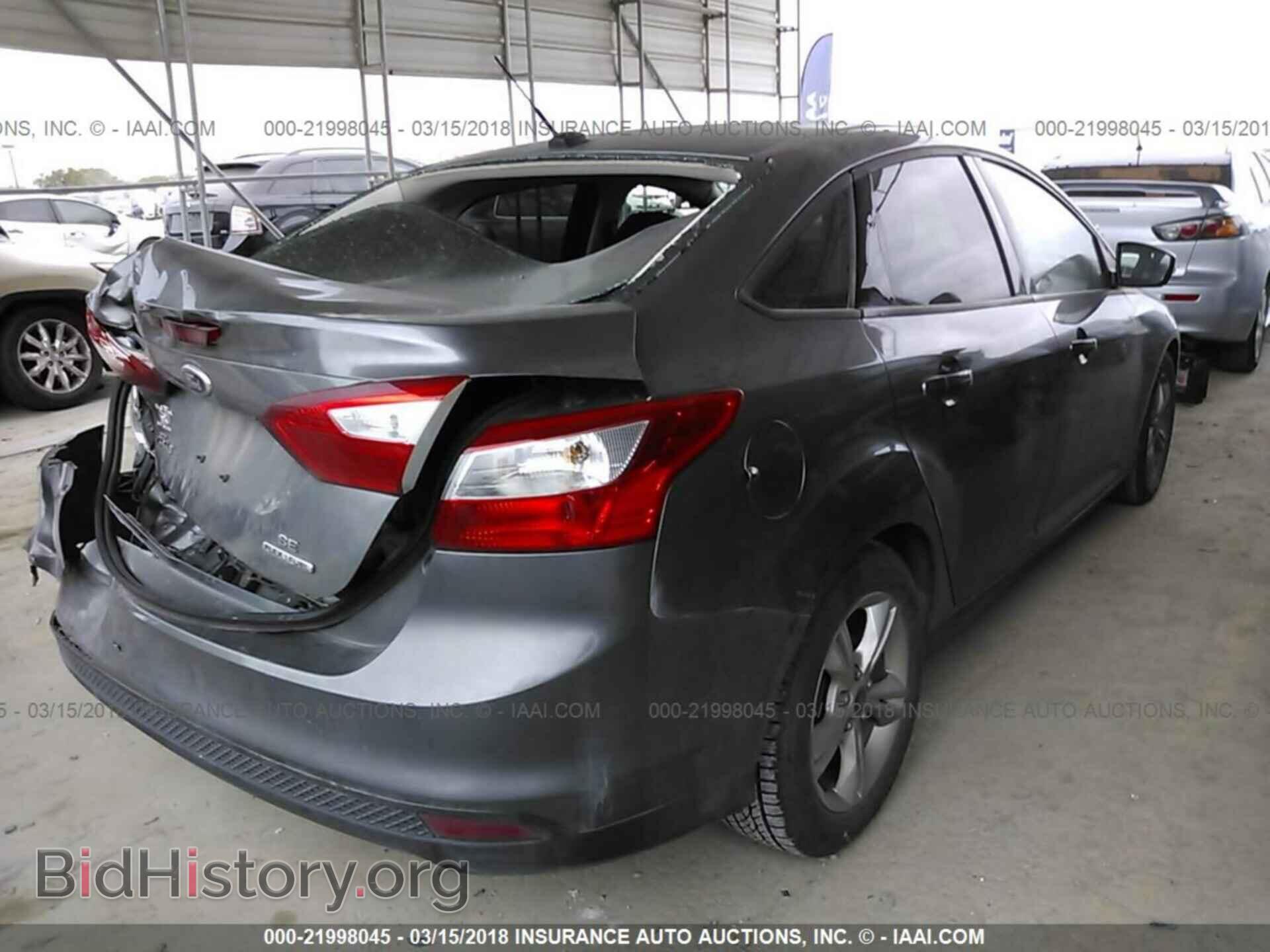 2014 Ford Focus - VIN: 1FADP3F21EL218287 - Photo 4