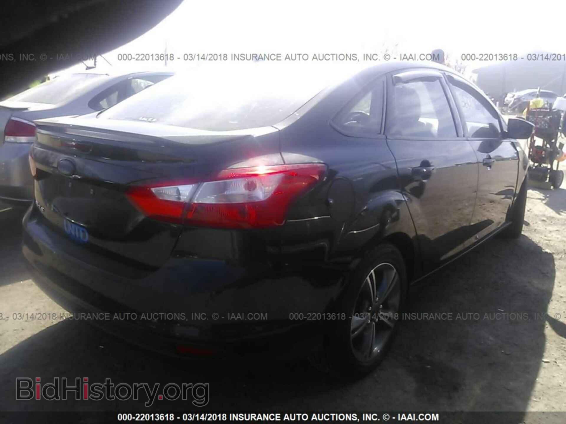 2014 Ford Focus - VIN: 1FADP3F22EL280071 - Photo 4