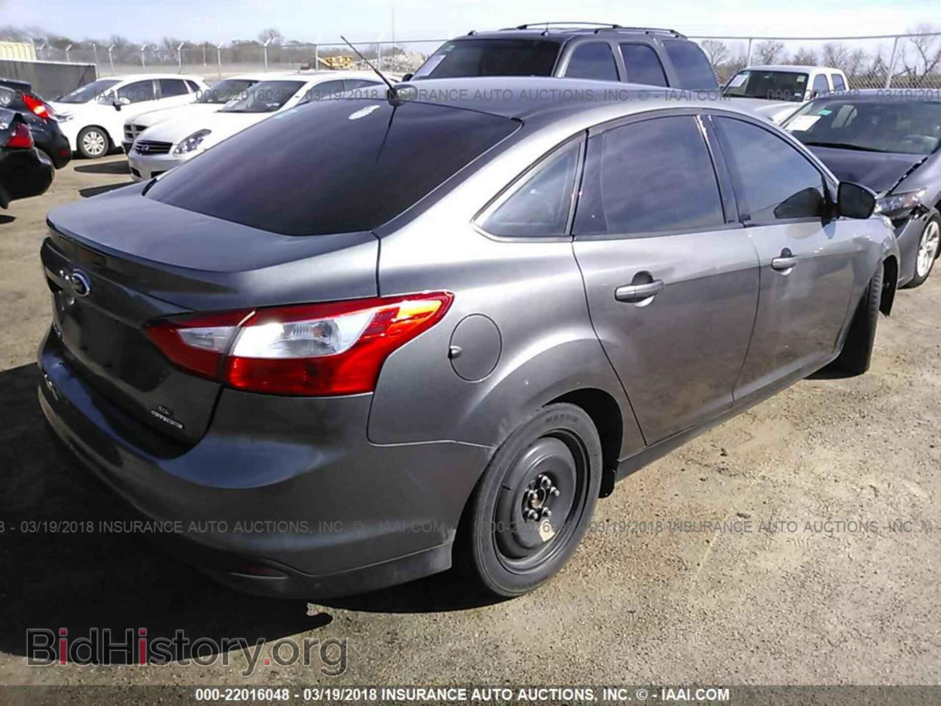 2014 Ford Focus - VIN: 1FADP3F27EL218262 - Фото 4