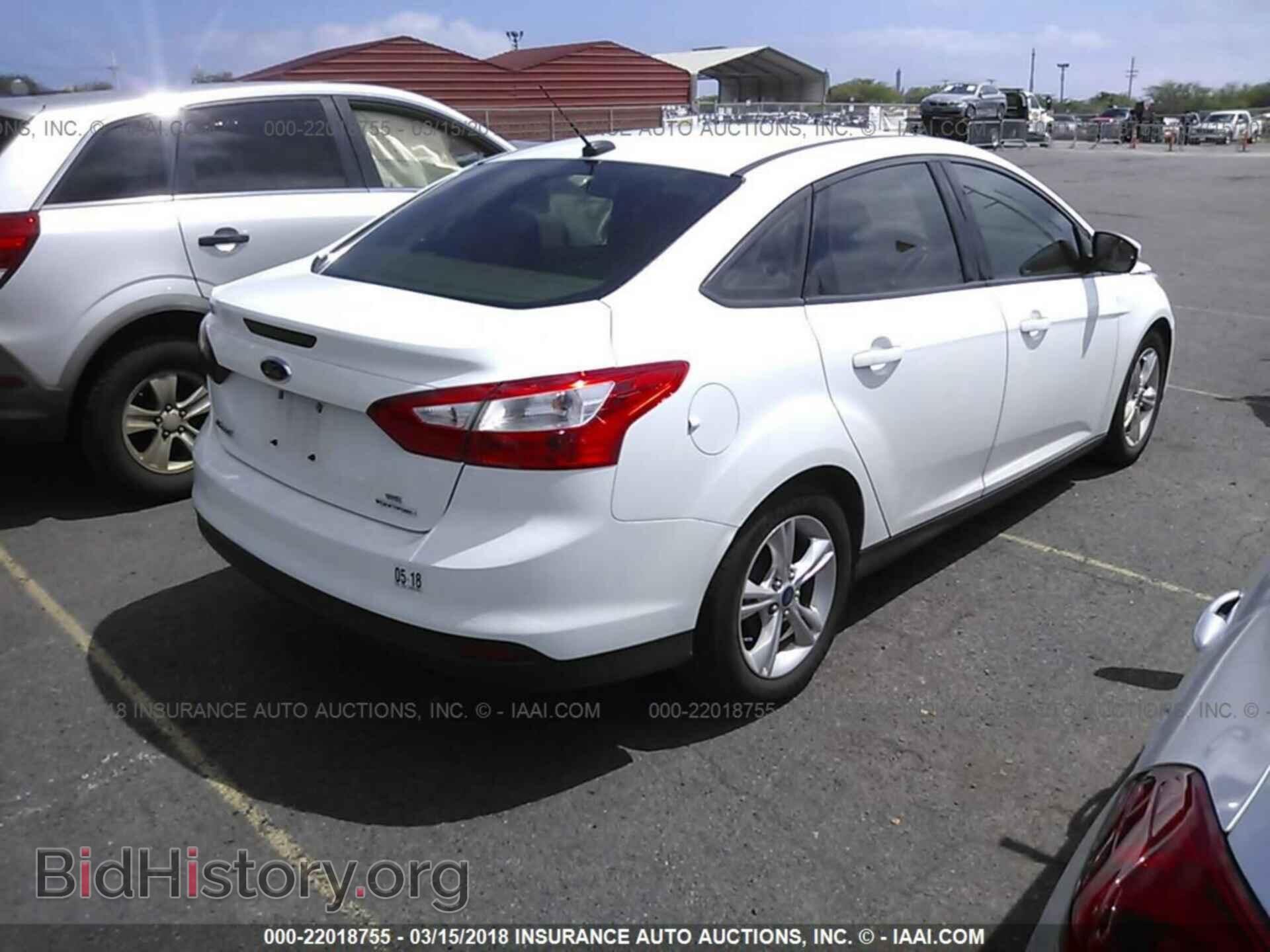 2014 Ford Focus - VIN: 1FADP3F21EL264623 - Photo 4