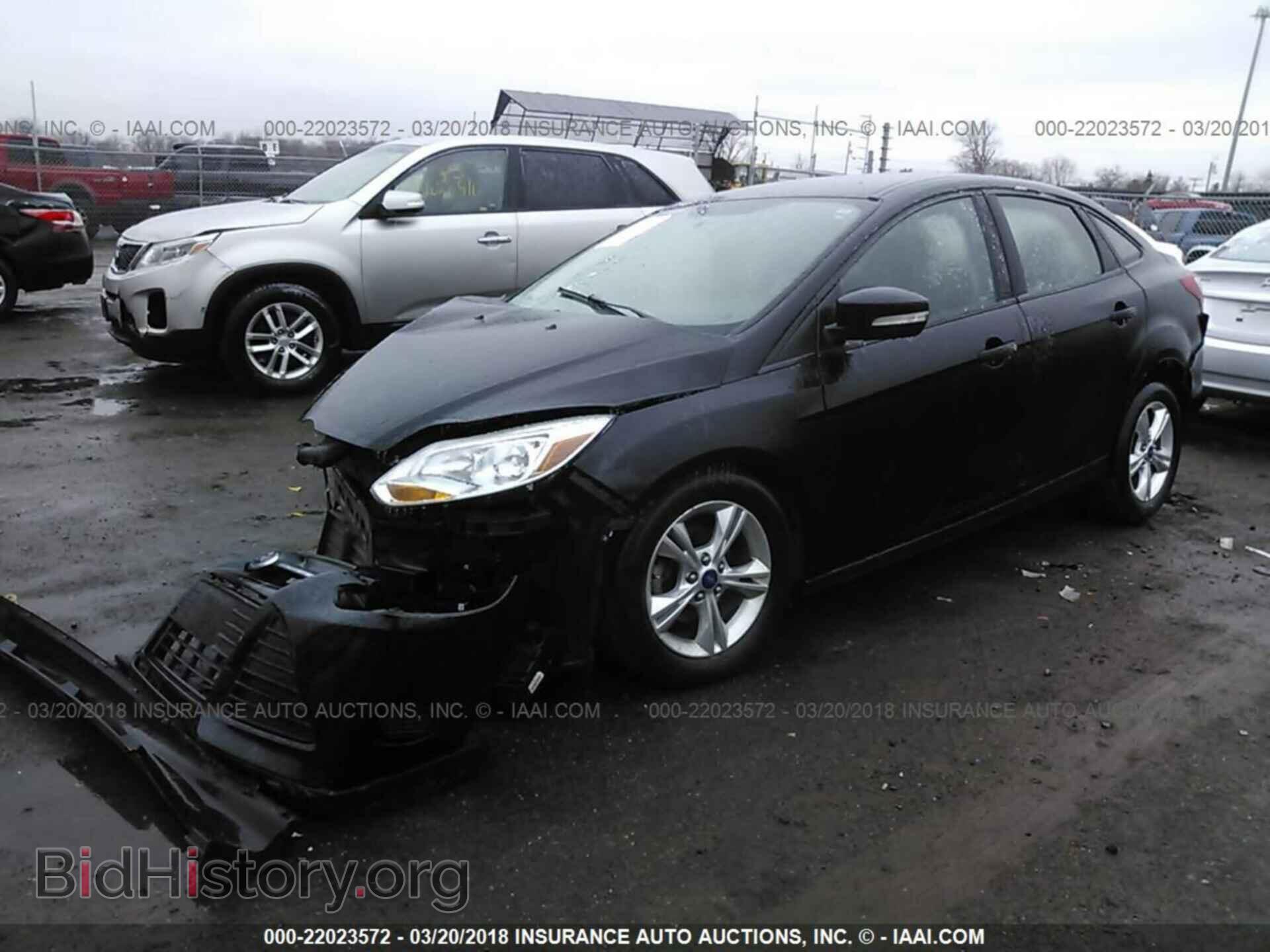 2014 Ford Focus - VIN: 1FADP3F24EL107216 - Фото 2
