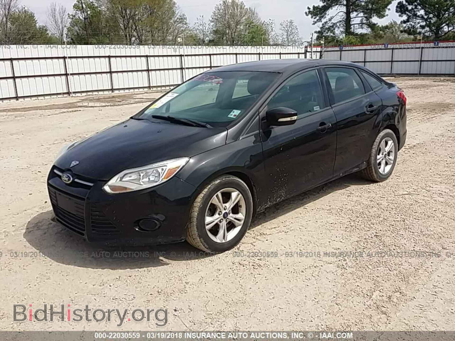2013 Ford Focus - VIN: 1FADP3F20DL241042 - Photo 2