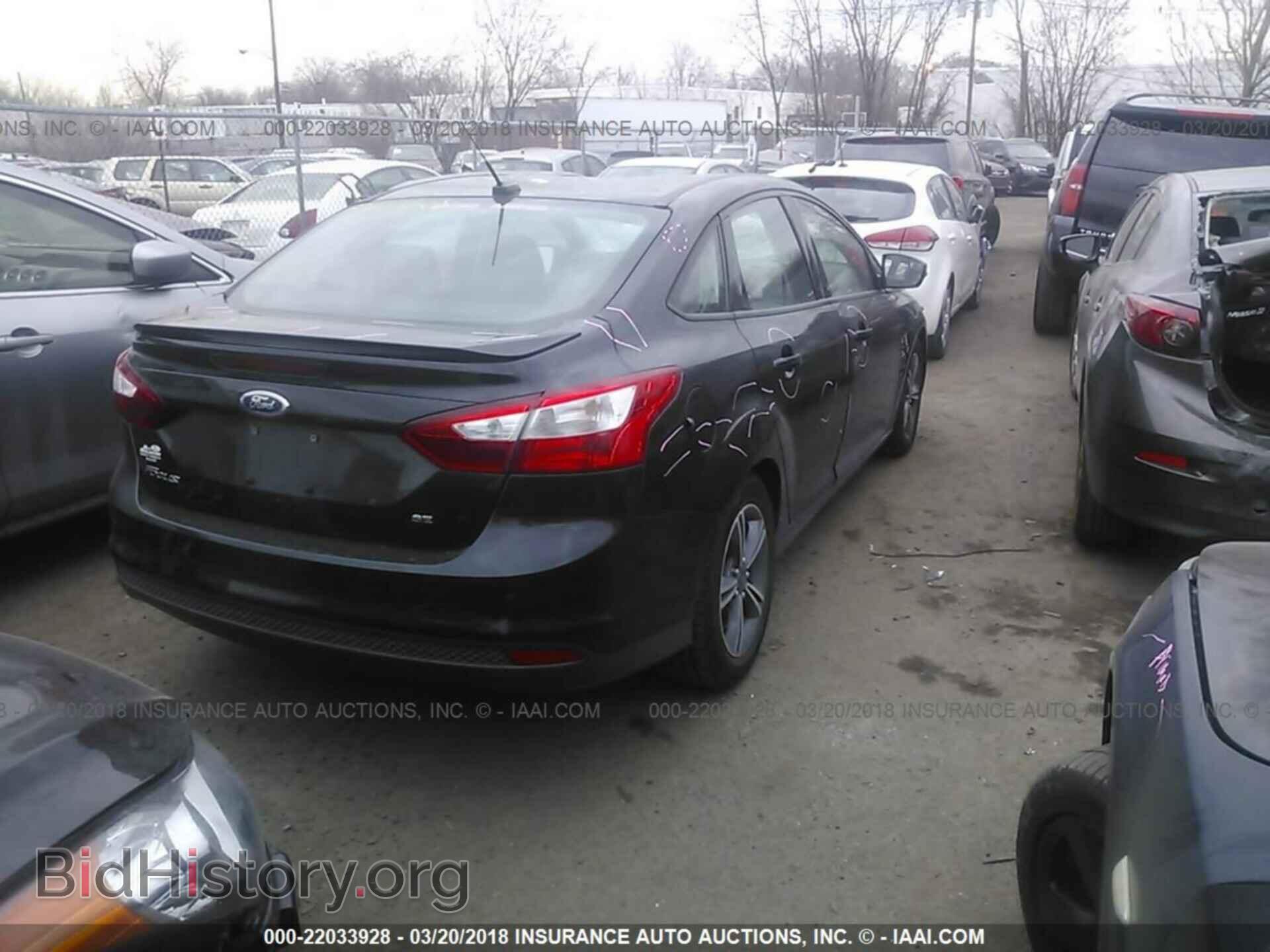 2014 Ford Focus - VIN: 1FADP3F2XEL201777 - Photo 4
