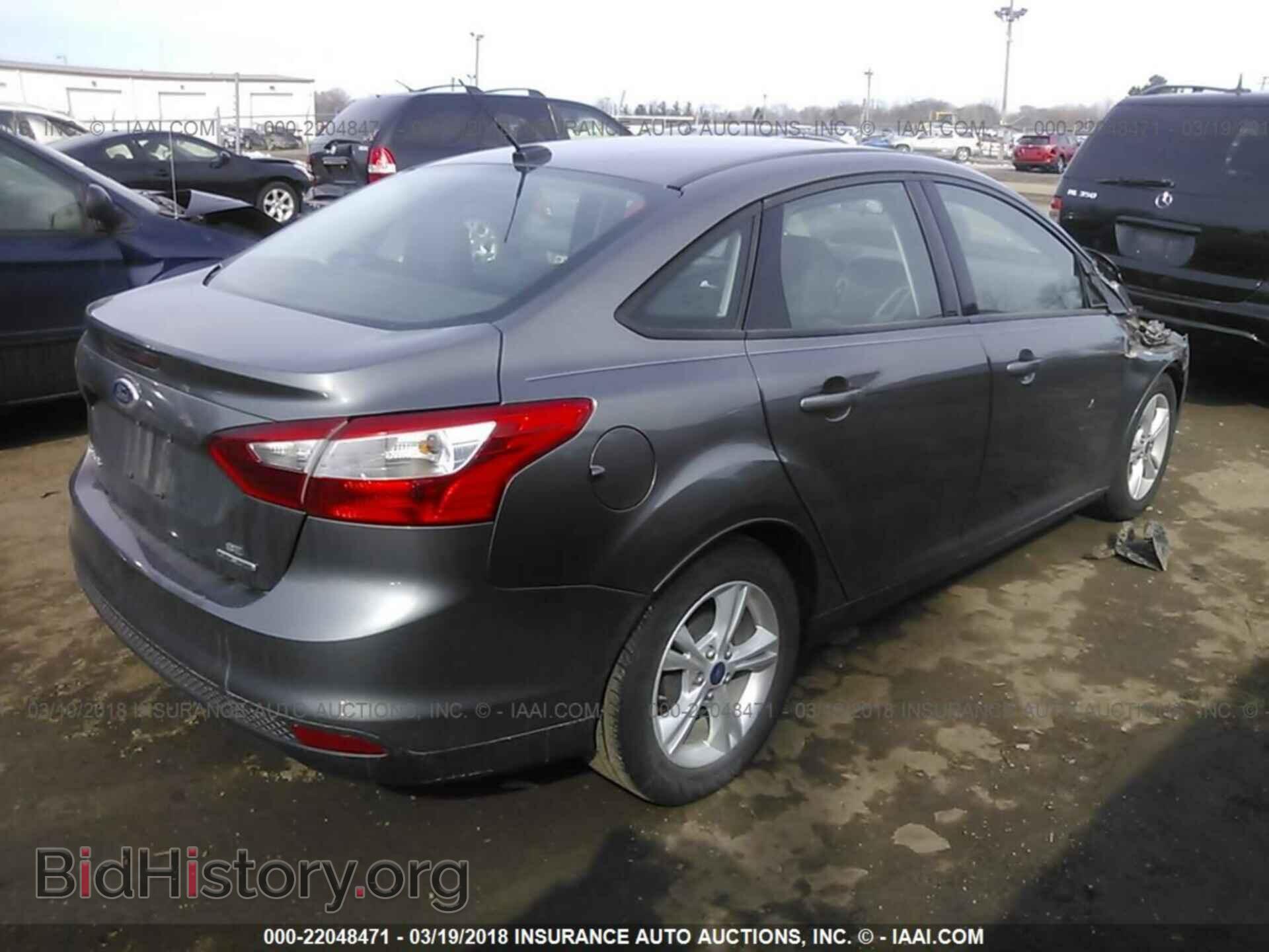 2014 Ford Focus - VIN: 1FADP3F25EL403989 - Photo 4