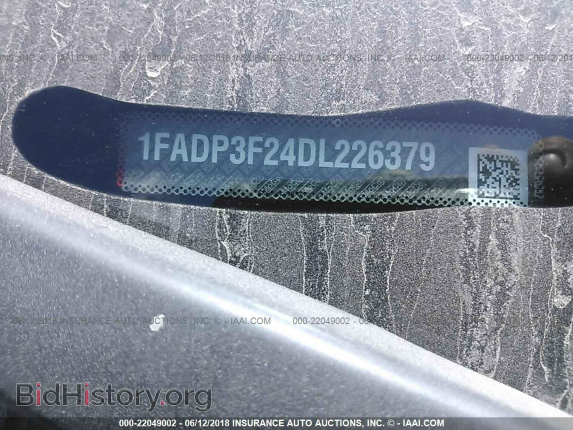 2013 Ford Focus - VIN: 1FADP3F24DL226379 - Photo 9