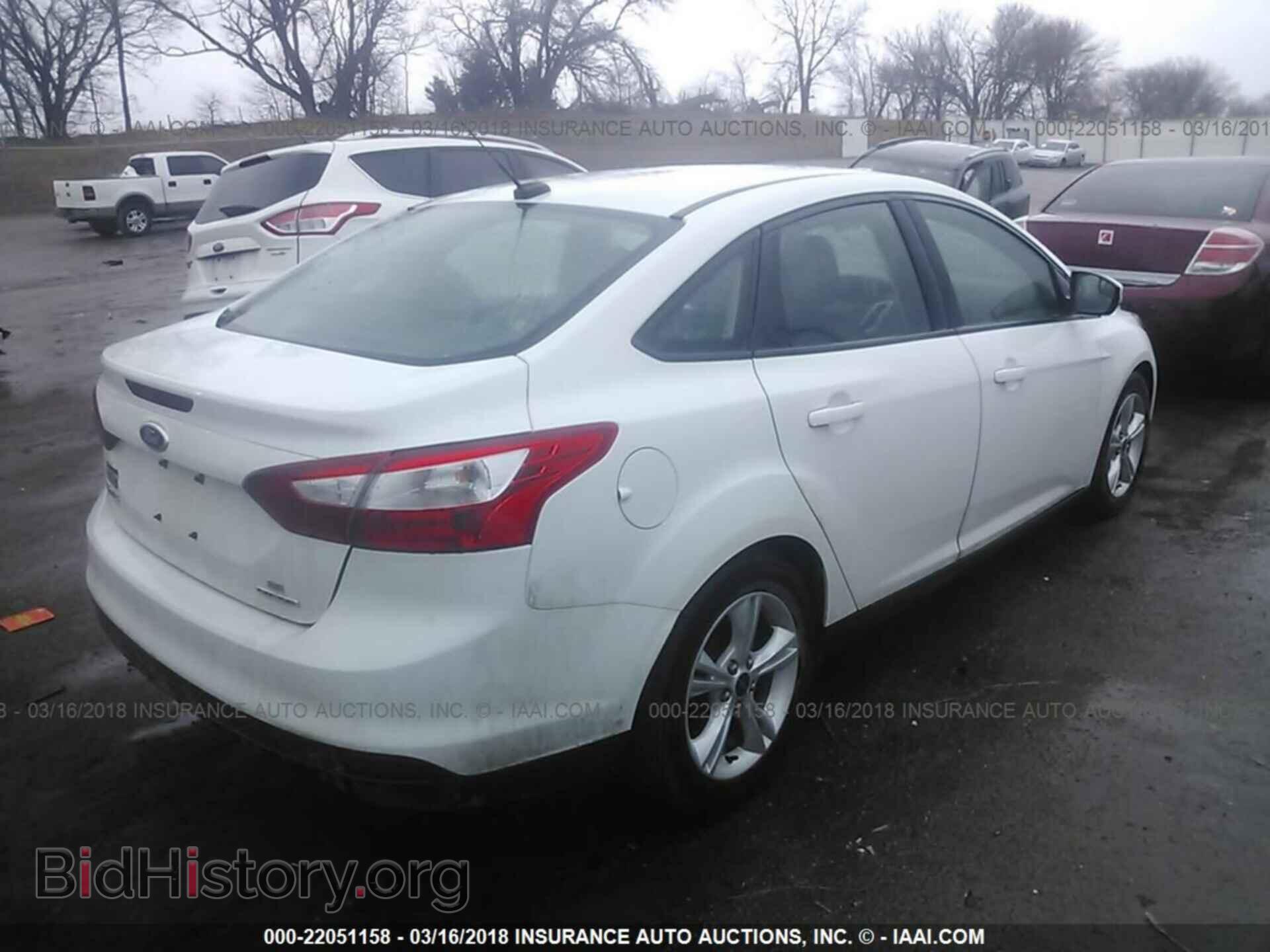 2014 Ford Focus - VIN: 1FADP3F27EL453180 - Photo 4