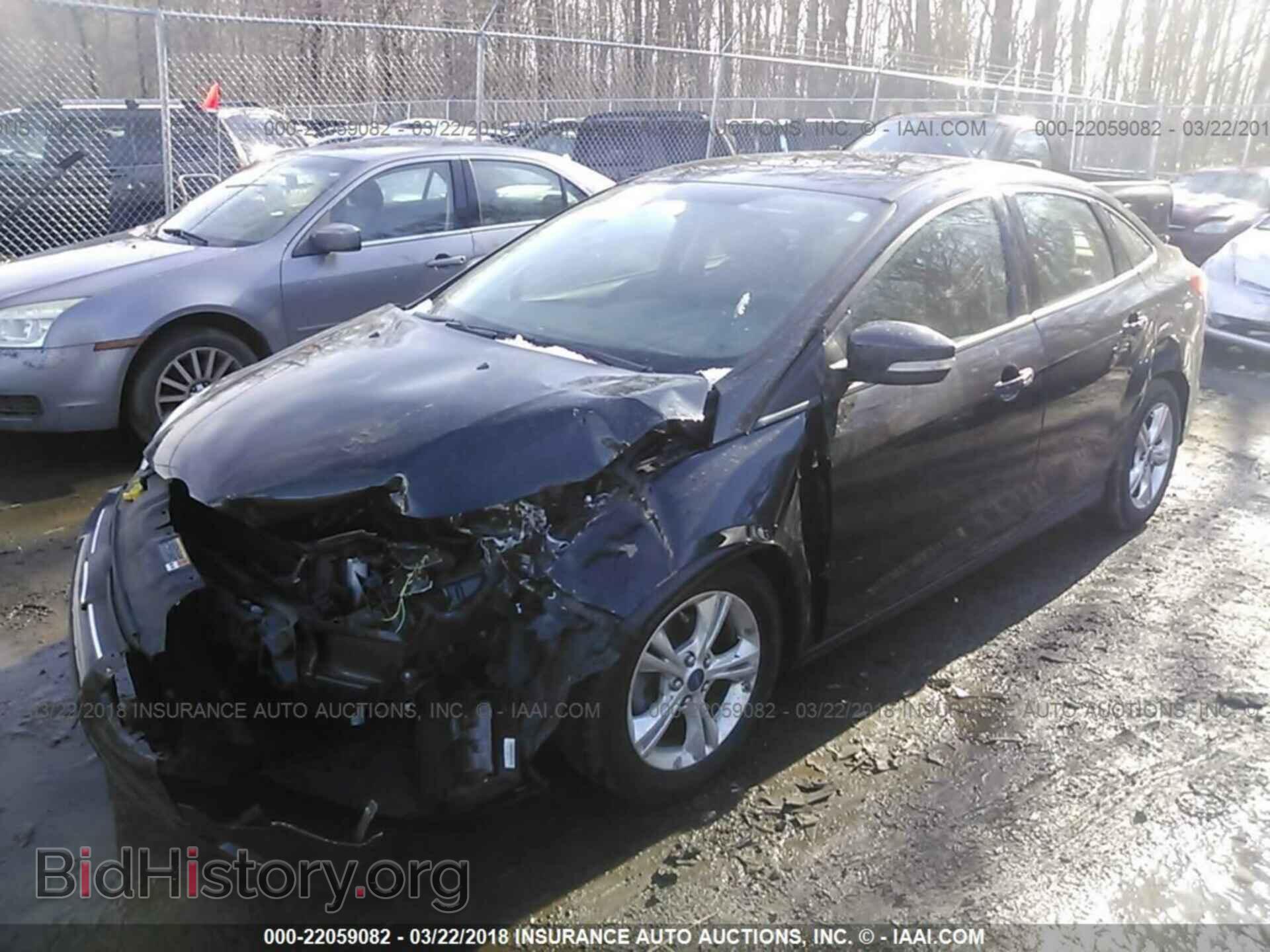 2014 Ford Focus - VIN: 1FADP3F26EL104933 - Photo 2