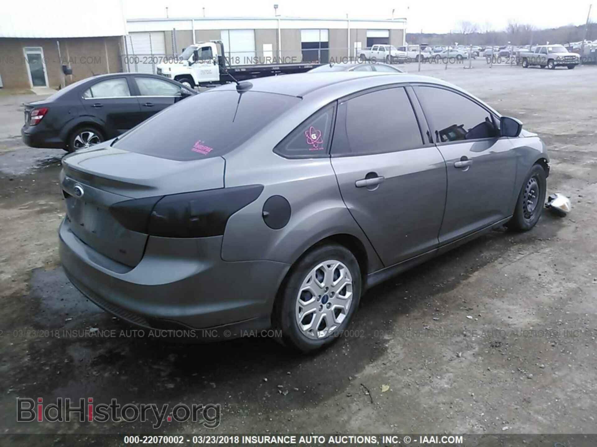 2012 Ford Focus - VIN: 1FAHP3F29CL321102 - Photo 4