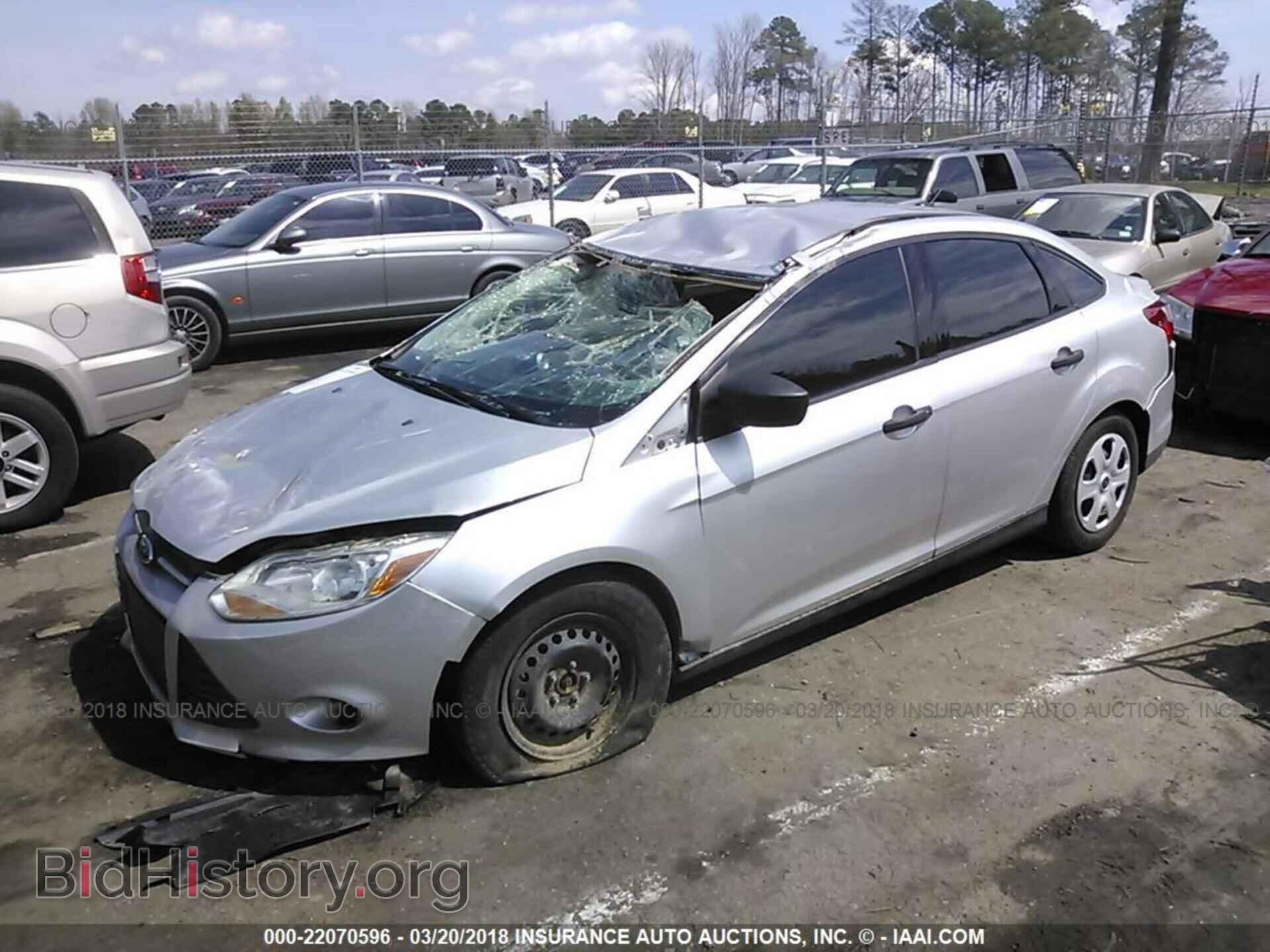 2014 Ford Focus - VIN: 1FADP3E23EL265824 - Фото 2