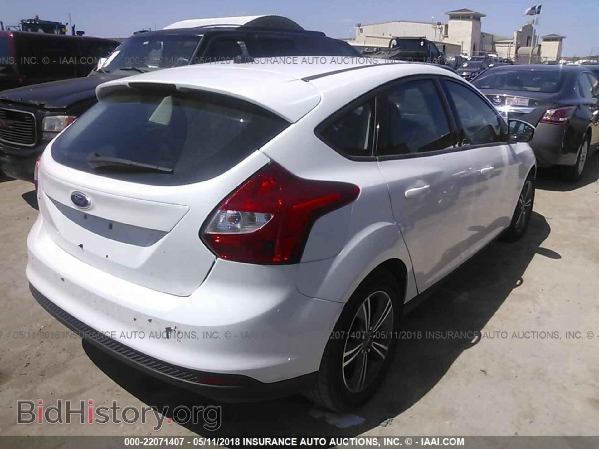 2014 Ford Focus - VIN: 1FADP3K2XEL412726 - Photo 4