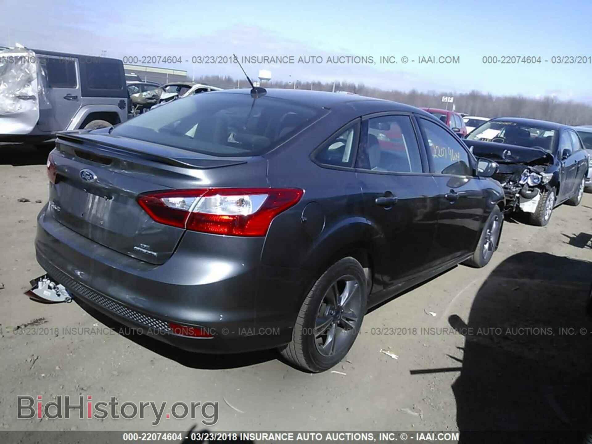 2014 Ford Focus - VIN: 1FADP3F26EL401037 - Фото 4