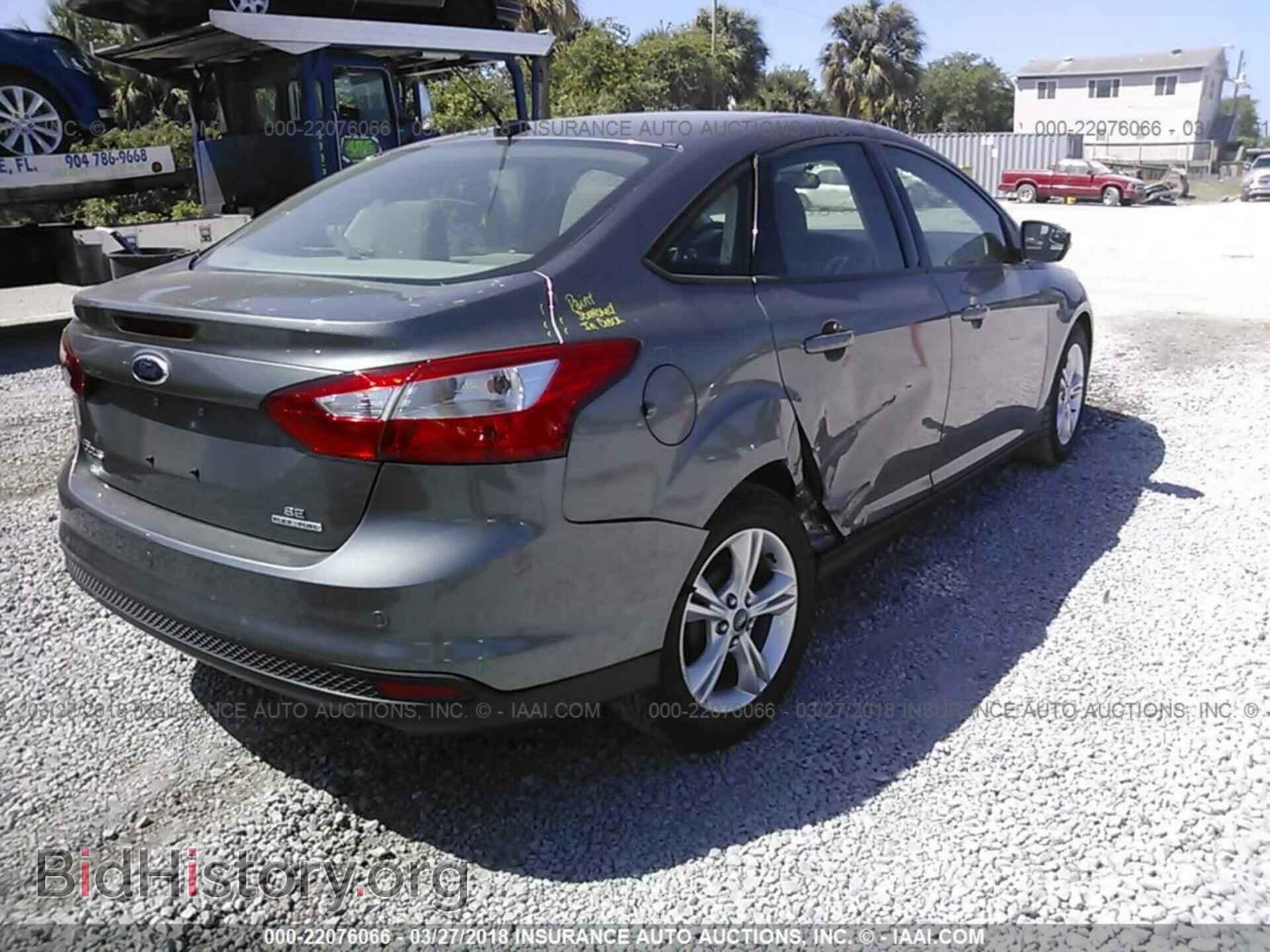 2014 Ford Focus - VIN: 1FADP3F21EL257980 - Photo 4