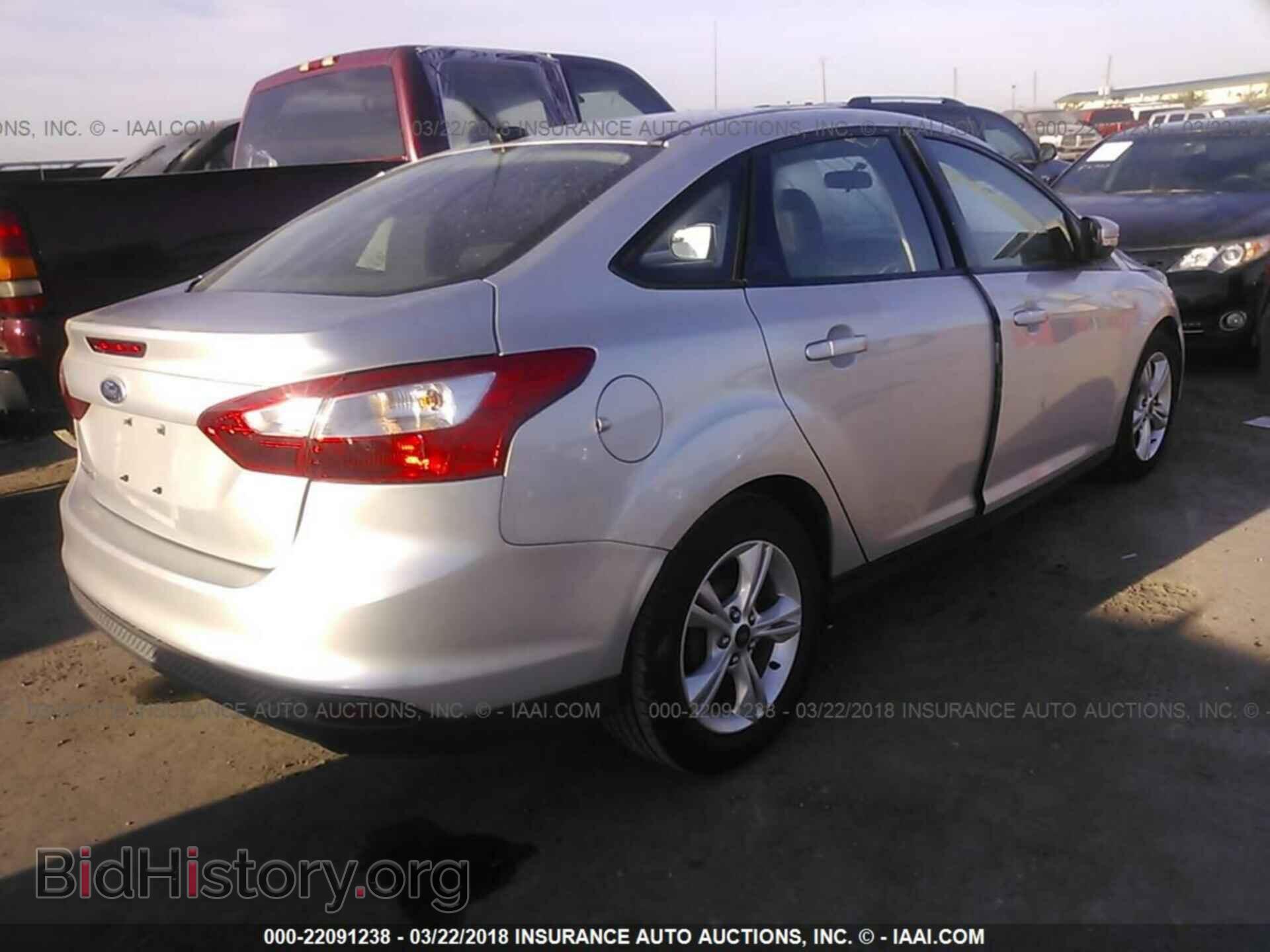 2014 Ford Focus - VIN: 1FADP3F25EL183379 - Фото 4