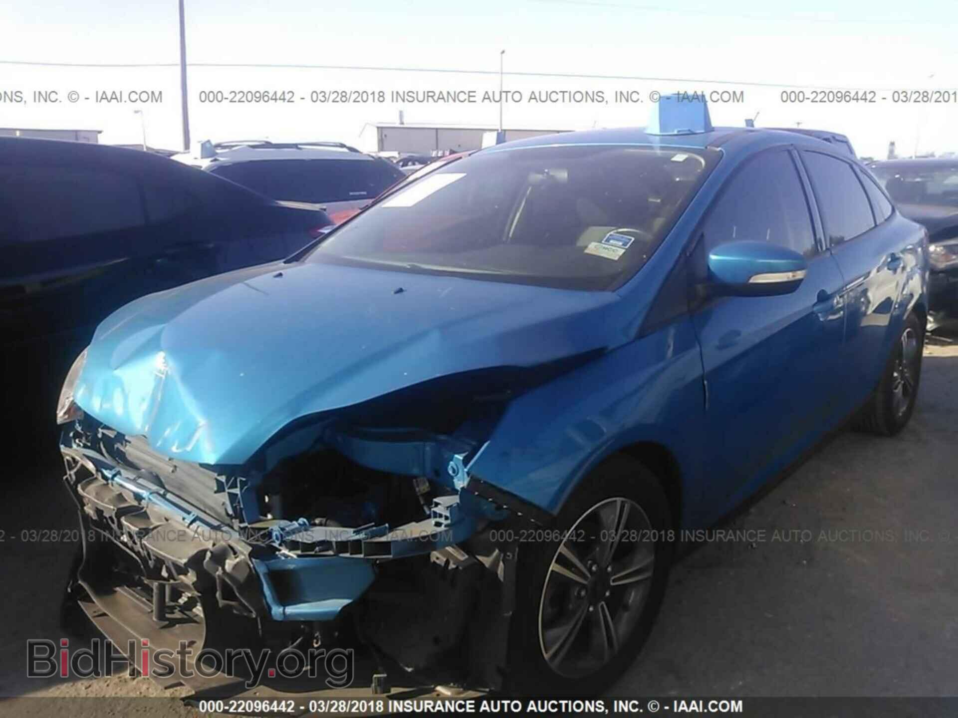2014 Ford Focus - VIN: 1FADP3F22EL165938 - Фото 2