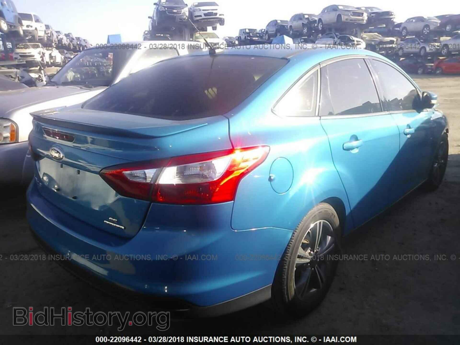 2014 Ford Focus - VIN: 1FADP3F22EL165938 - Фото 4