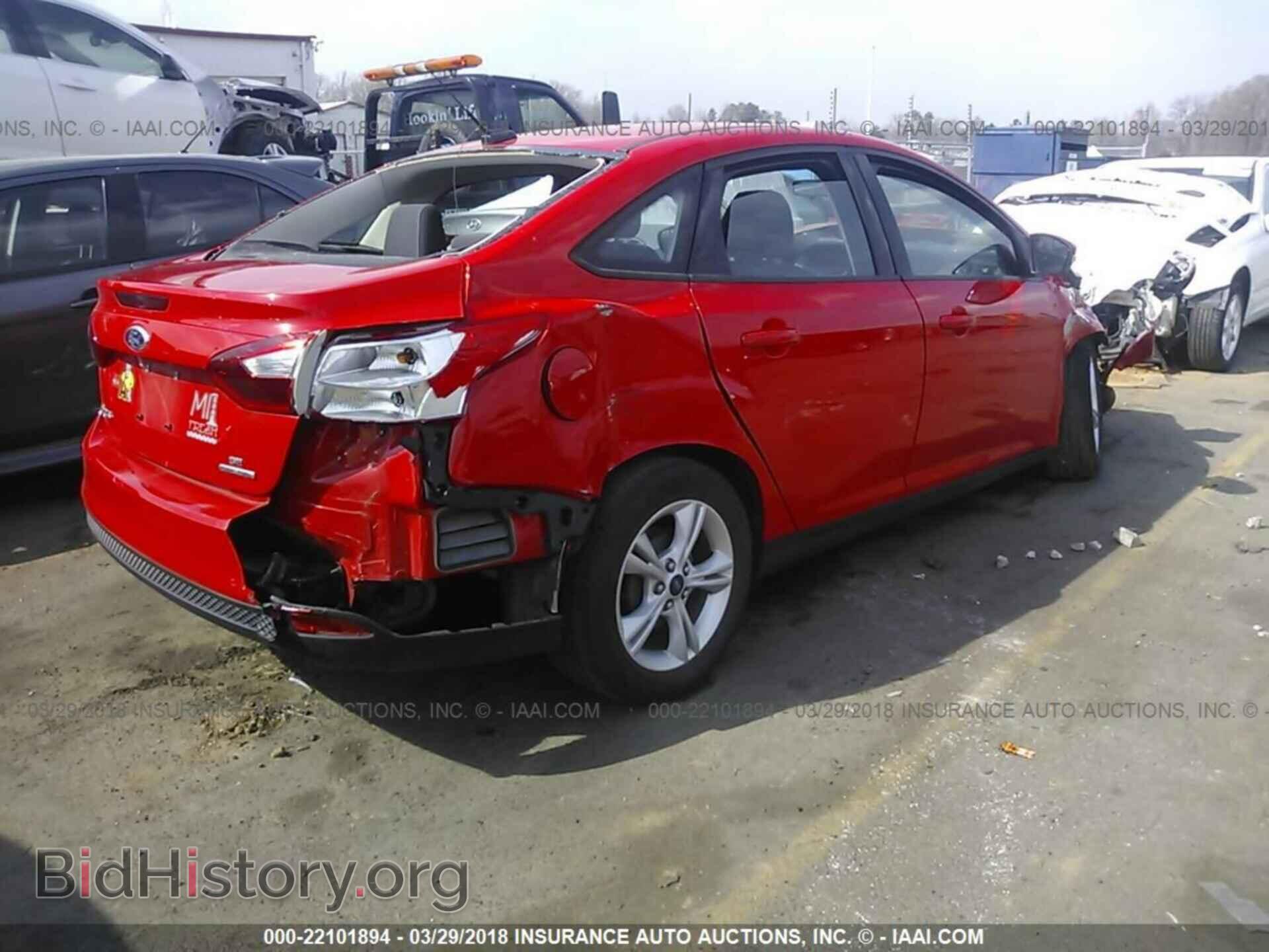 2014 Ford Focus - VIN: 1FADP3F21EL449335 - Photo 4