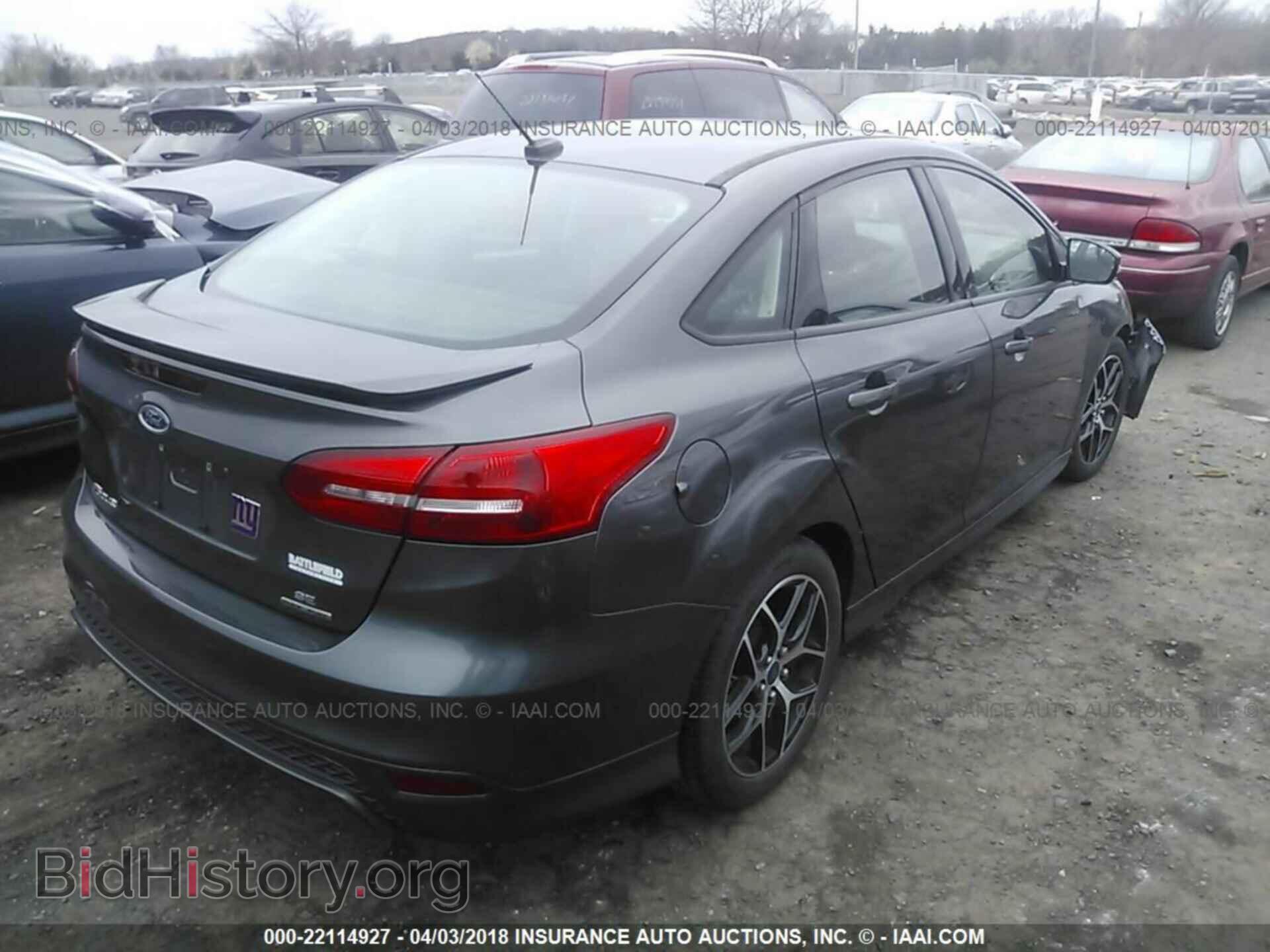 2015 Ford Focus - VIN: 1FADP3F24FL218639 - Photo 4