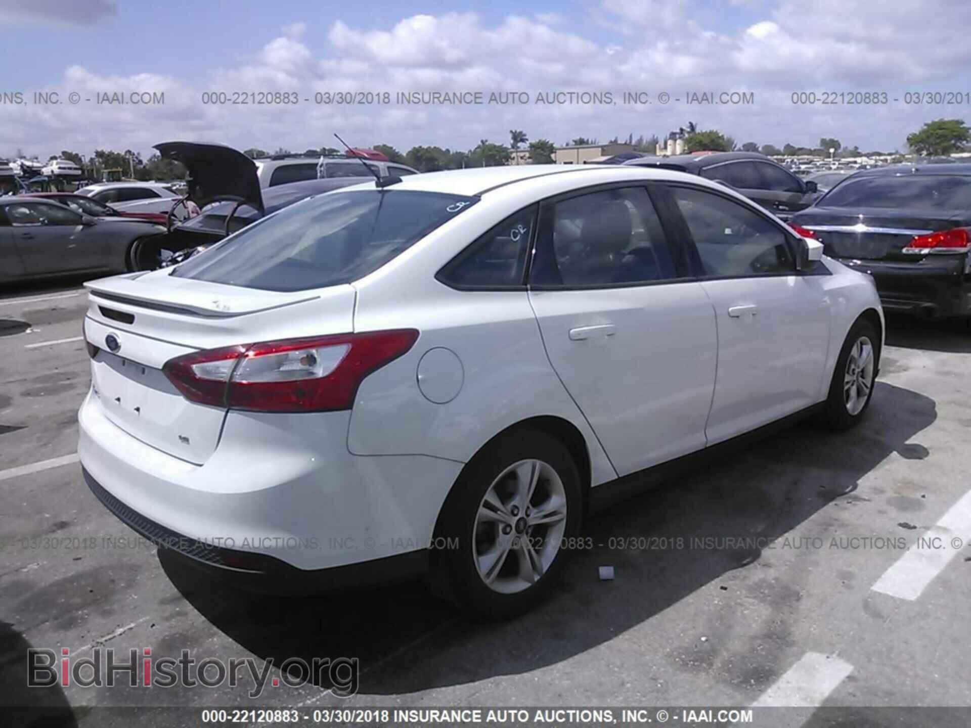 2012 Ford Focus - VIN: 1FAHP3F21CL360492 - Photo 4