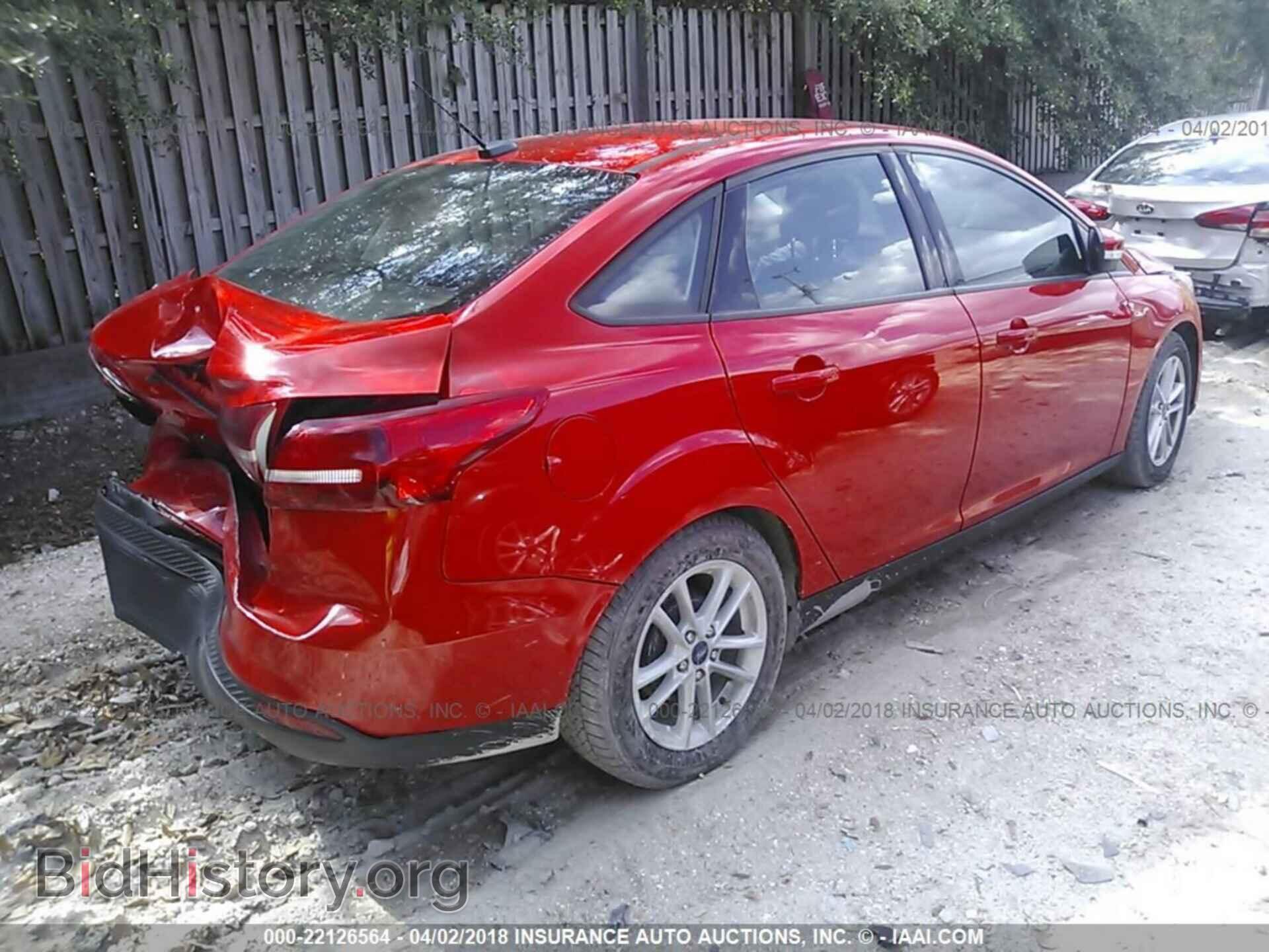 2016 Ford Focus - VIN: 1FADP3F29GL277493 - Photo 4