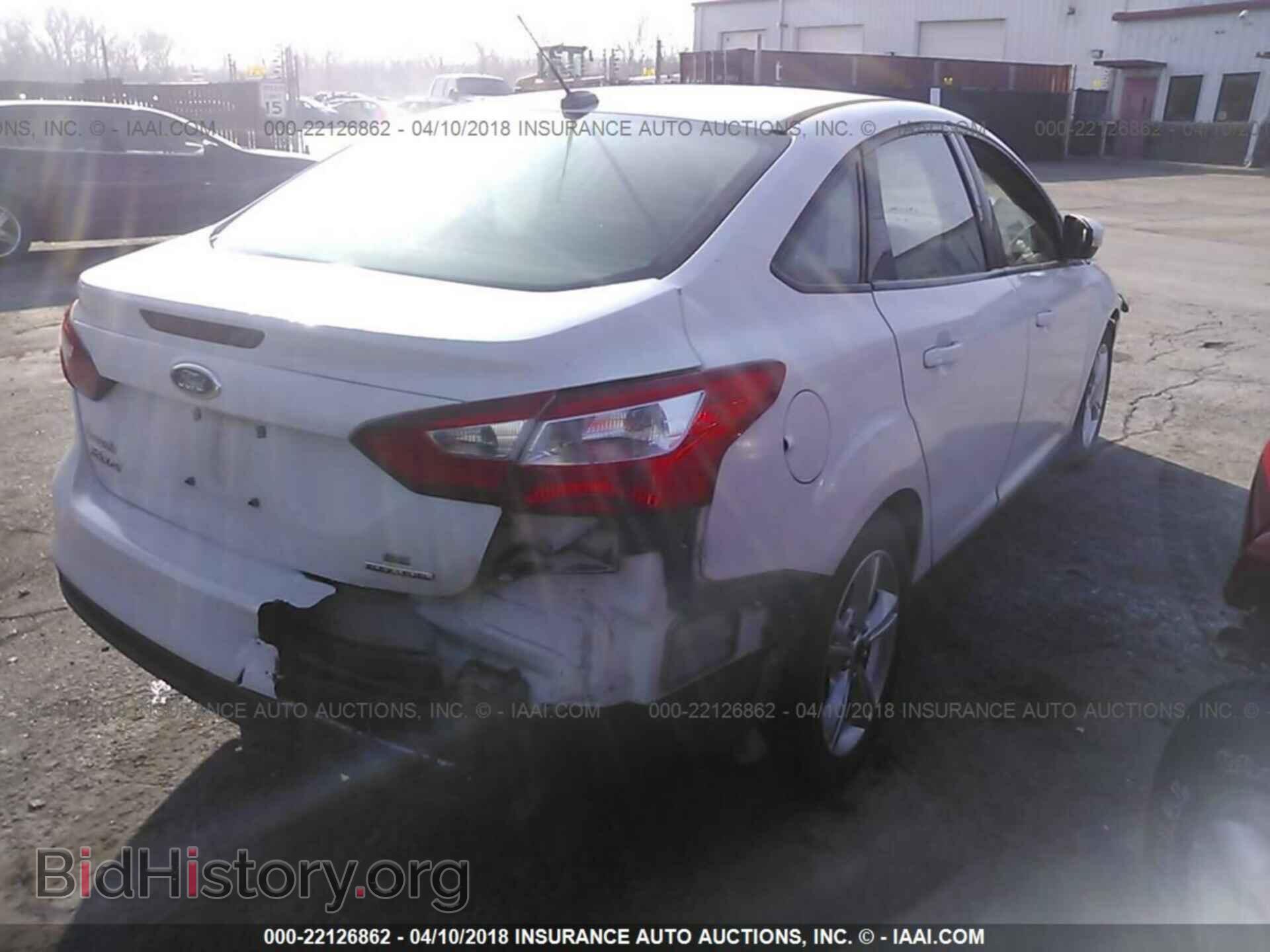 2014 Ford Focus - VIN: 1FADP3F22EL390506 - Photo 4