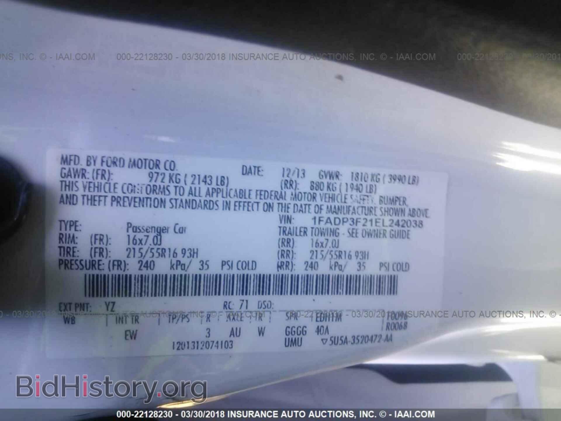2014 Ford Focus - VIN: 1FADP3F21EL242038 - Photo 9
