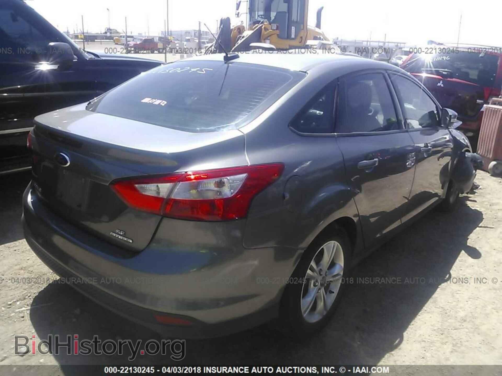 2014 Ford Focus - VIN: 1FADP3F21EL183749 - Photo 4
