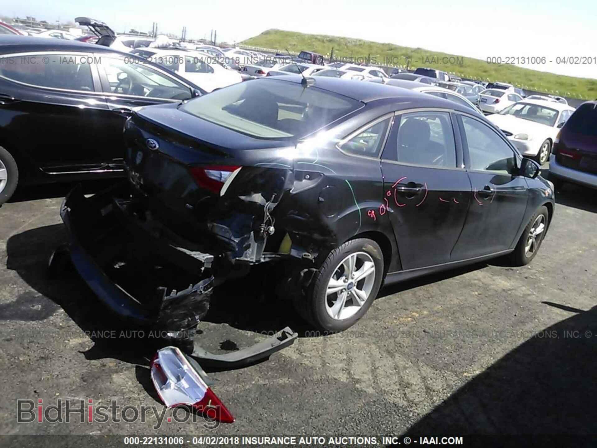 2013 Ford Focus - VIN: 1FADP3F20DL116672 - Фото 4