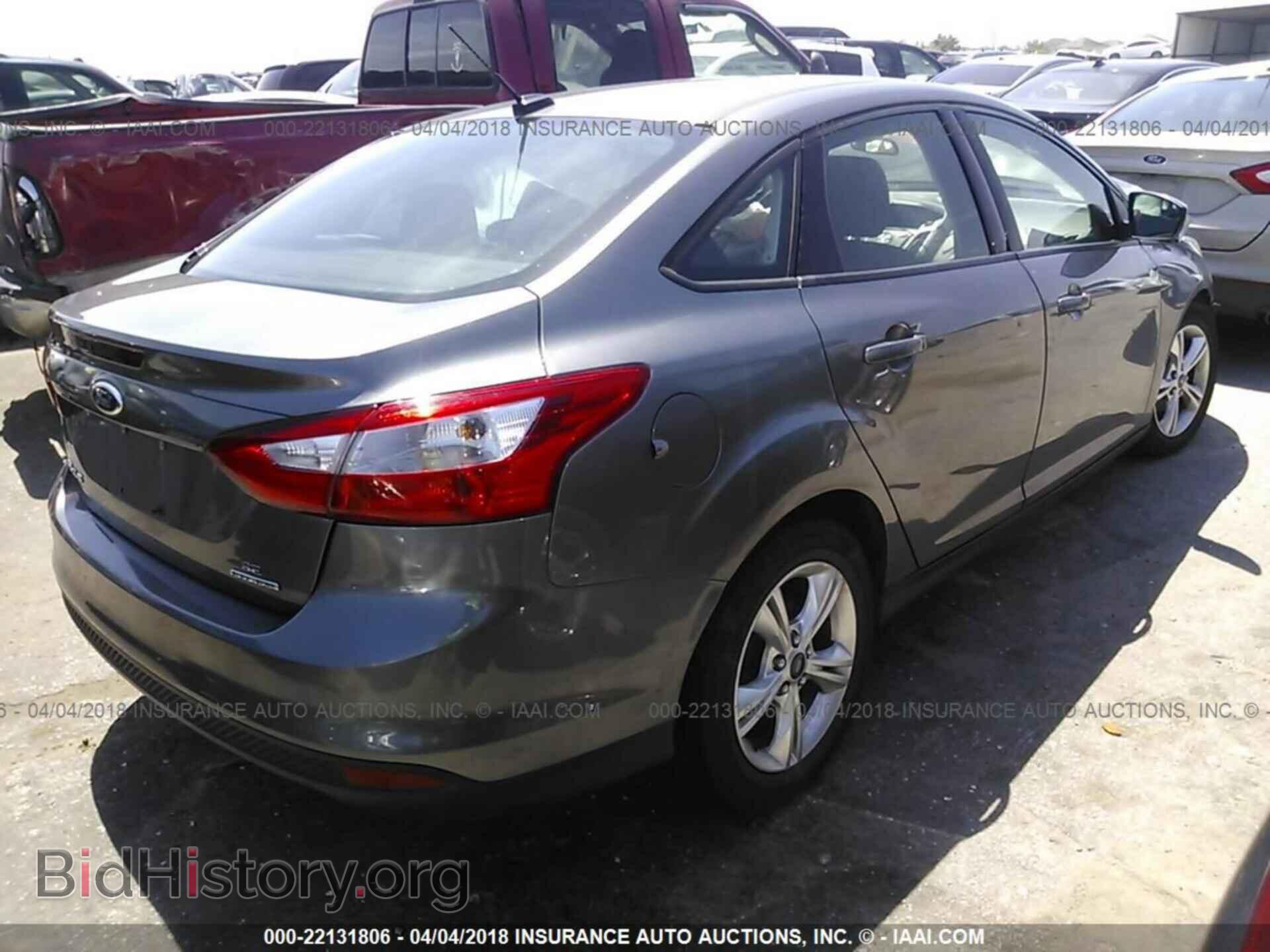 2014 Ford Focus - VIN: 1FADP3F20EL143548 - Photo 4