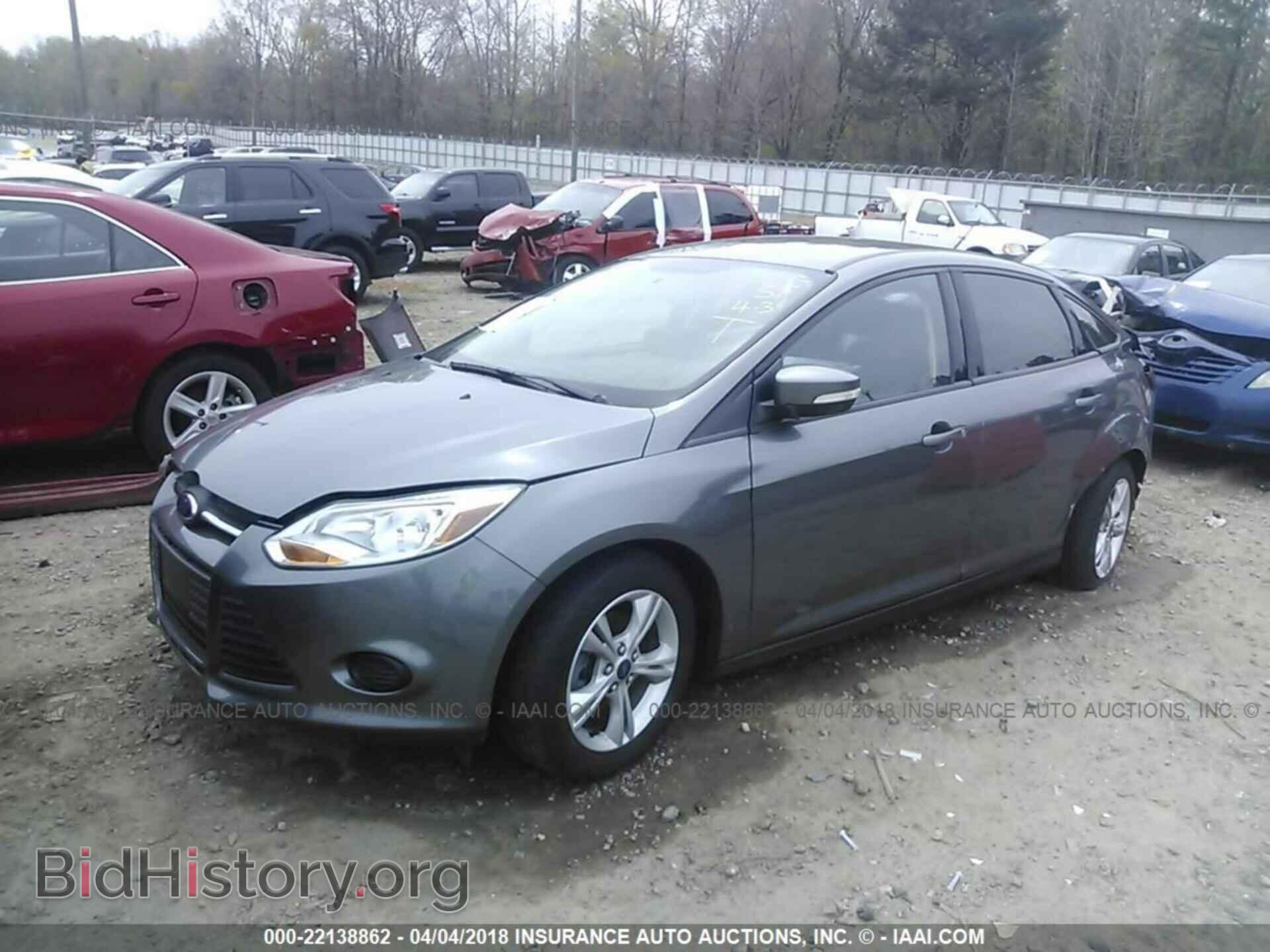 2014 Ford Focus - VIN: 1FADP3F27EL321701 - Photo 2